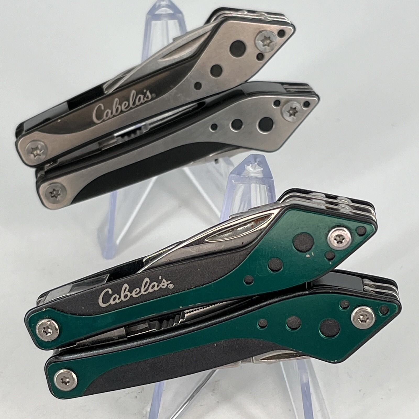 LOT OF 2 Cabela’s SILVER & GREEN Mini Multi-Tool Spring Open Pliers Scissors Saw