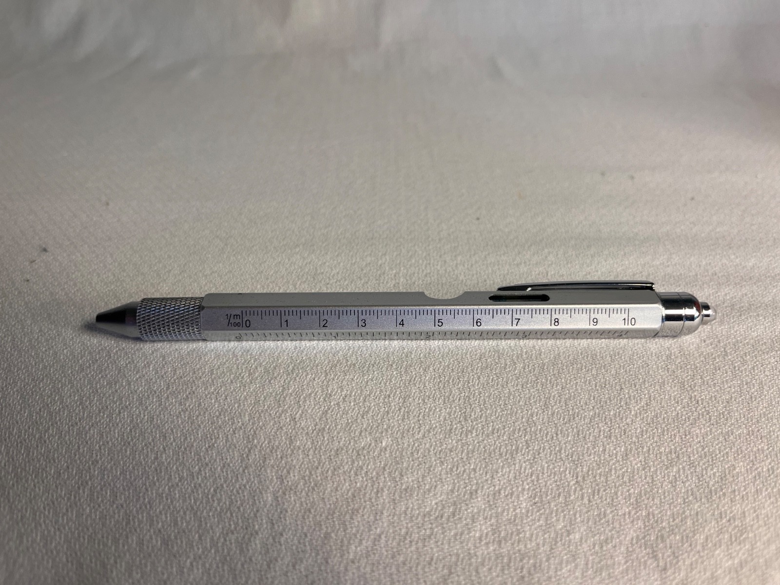 Unused Multi-tool Pen 9-in-1 functions with batteries and ink refills (in box)