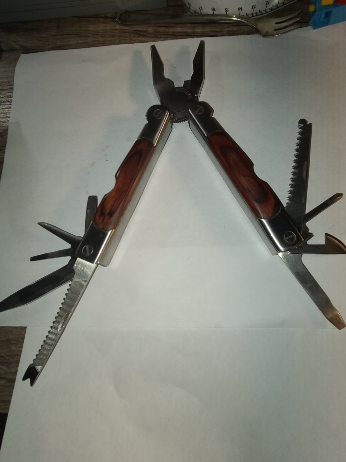 Similar to Leatherman Multi-Tool Sheffield 2CR Wood Grain Handle 12 in 1 minty!