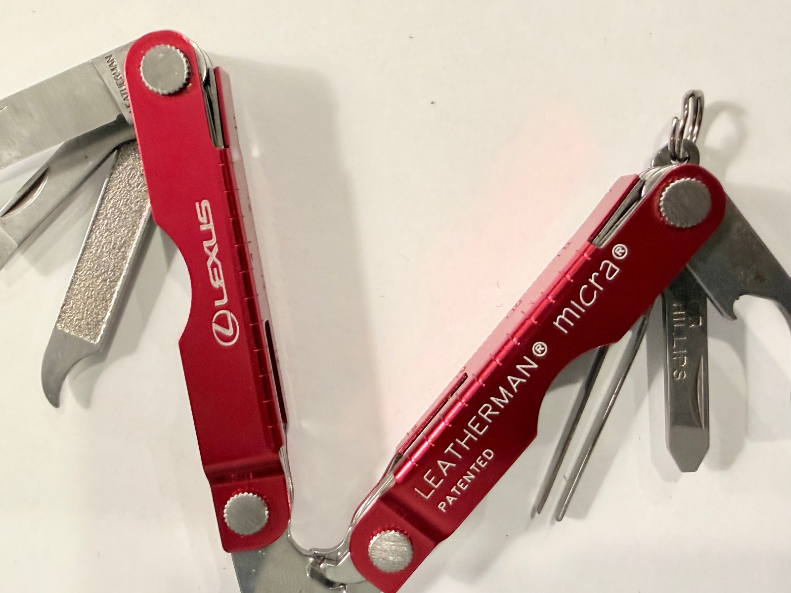 LEATHERMAN MICRA RED METALLIC MULTI-TOOL – ADVERTISEMENT LEXUS
