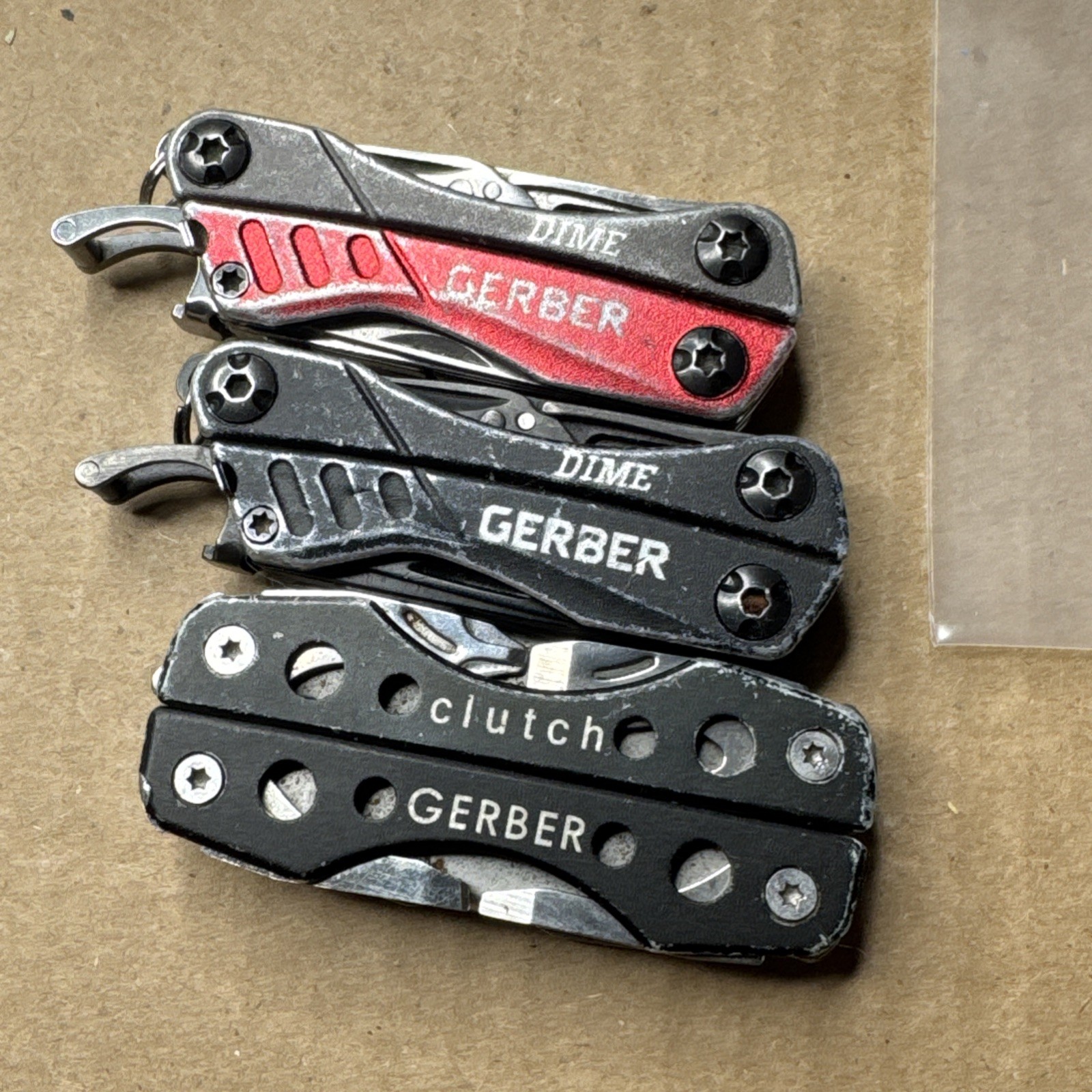 (2) Gerber Dime Multi Tools And (1) Gerber Clutch