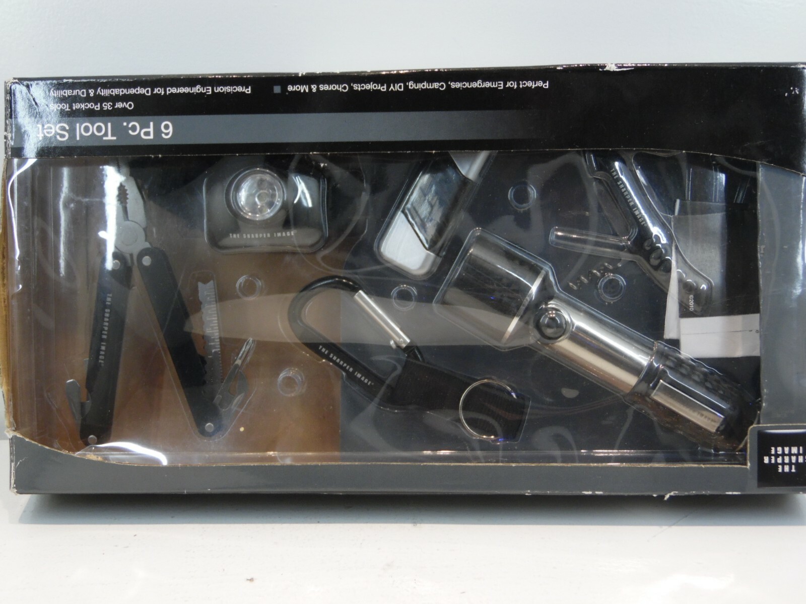 Sharper Image Tool set NIB(912t4) 6pc. tool set over 35 pocket tools. perfect fo