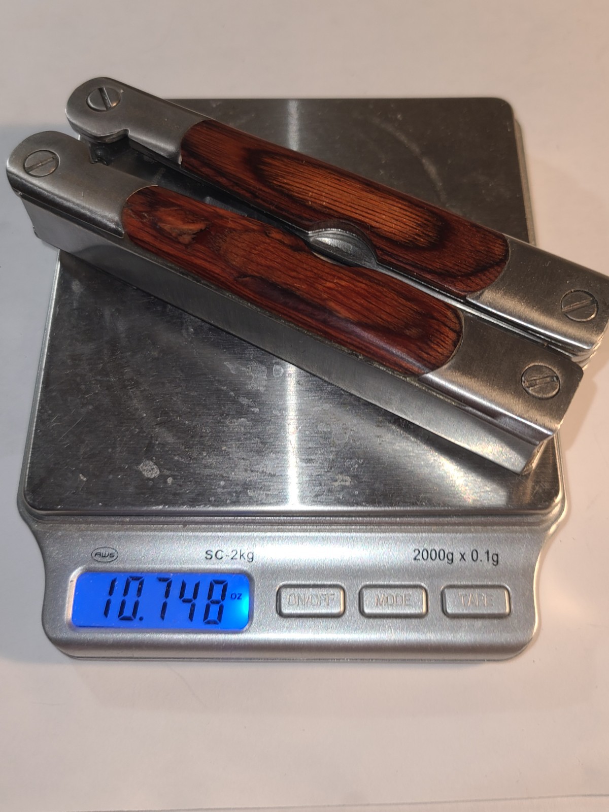 Similar to Leatherman Multi-Tool Sheffield 2CR Wood Grain Handle 12 in 1 minty!