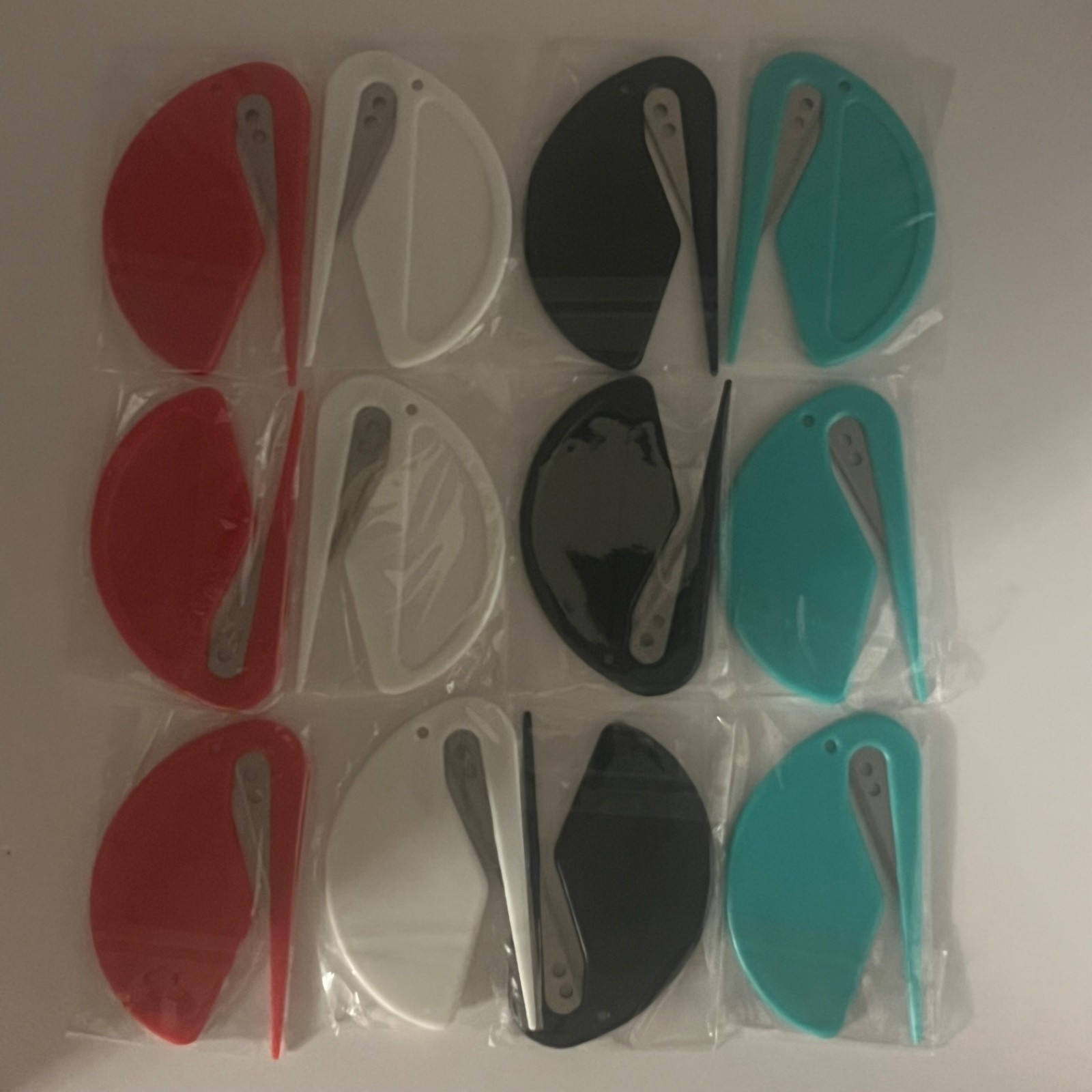 Lot of 12 Multi Color – Teal, White, Red, Black – Seatbelt Cutter Saftey Tools