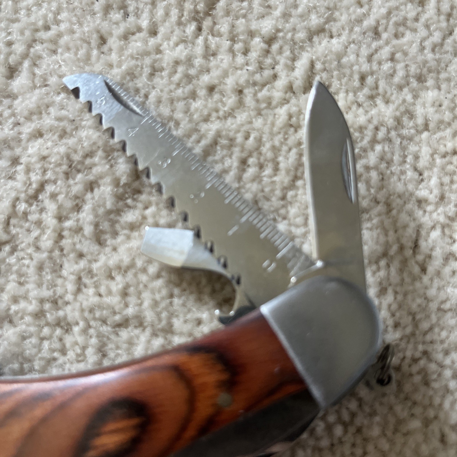 Camping Knife Wooden Handle with 7 Different Tools Attached with a Hanging Ring