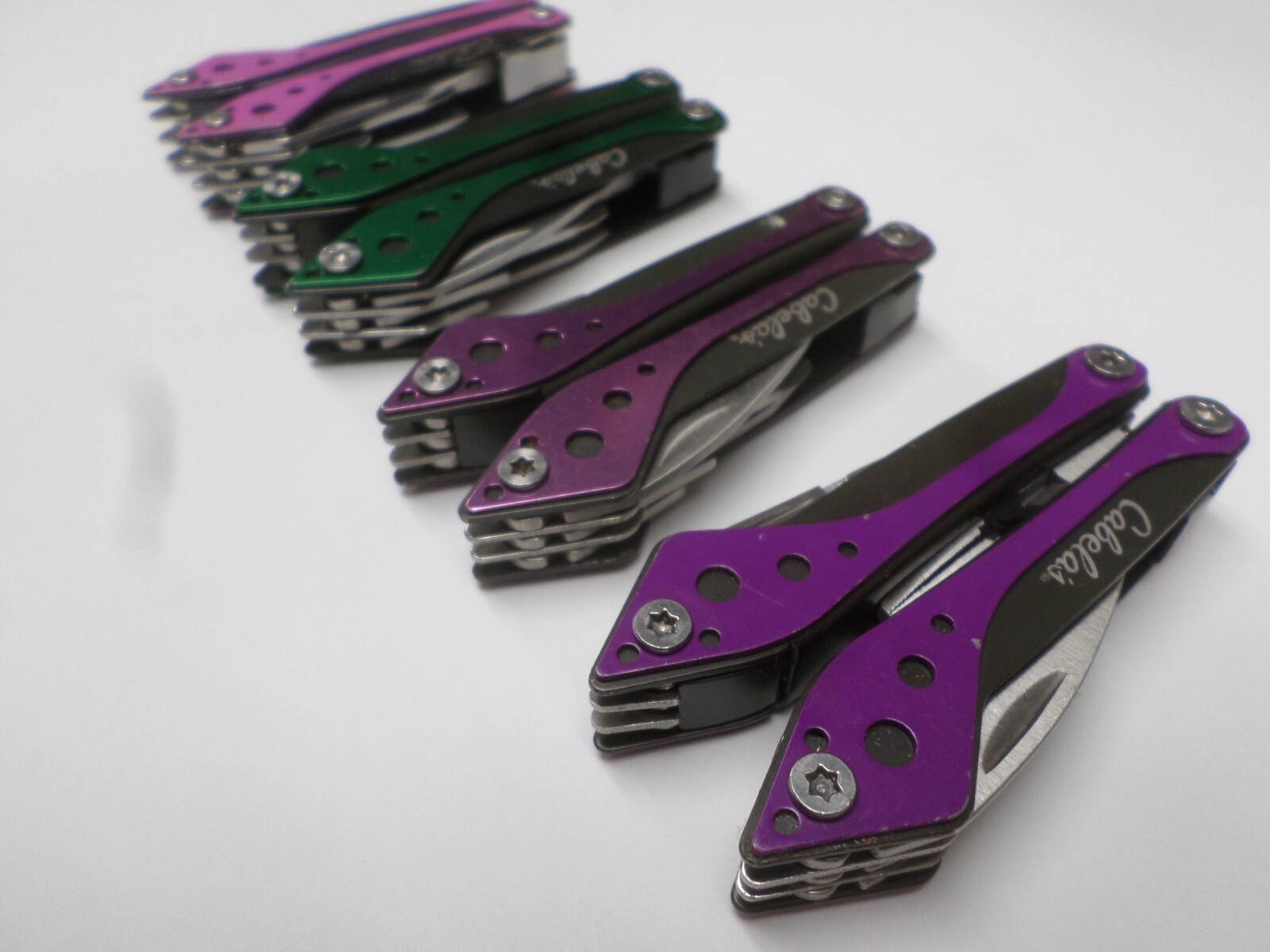 Lot of 4 Cabela’s Mini Multi Tools Spring Open Needle Nose Pliers Scissors Saw