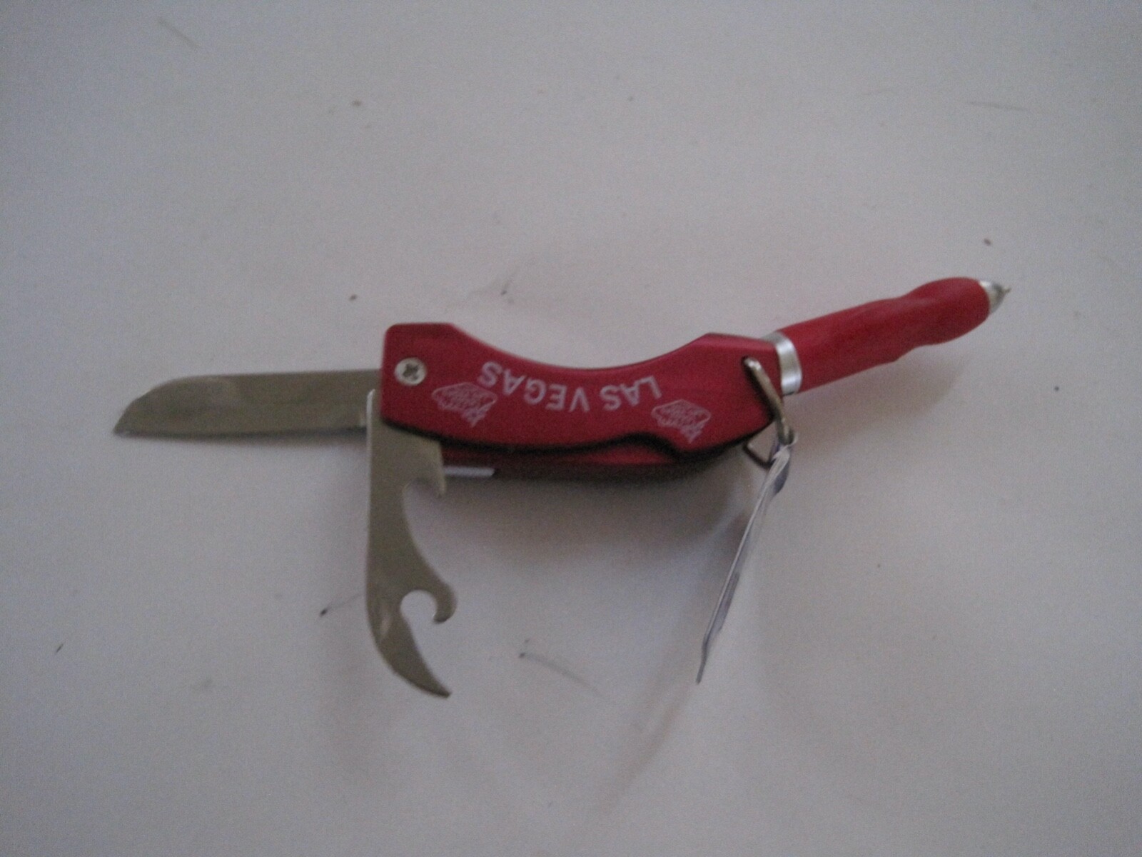 SNCO Multi Tool Pen Knife Opener Flashlight Las Vegas Red