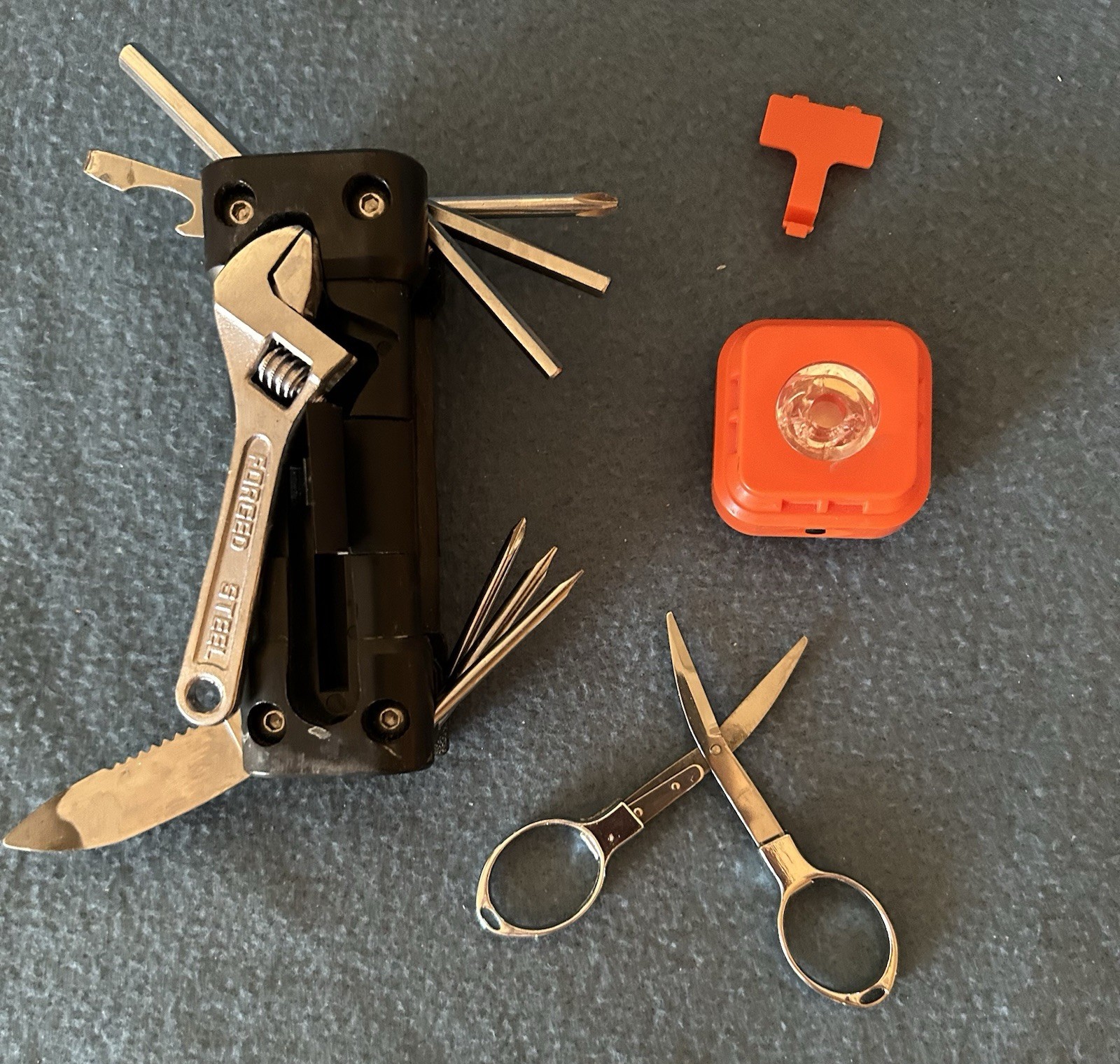 Black 8-in-1 Camping Multi-Tool w/ Serrated 1″ Knife, Scissors, Wrench, LED