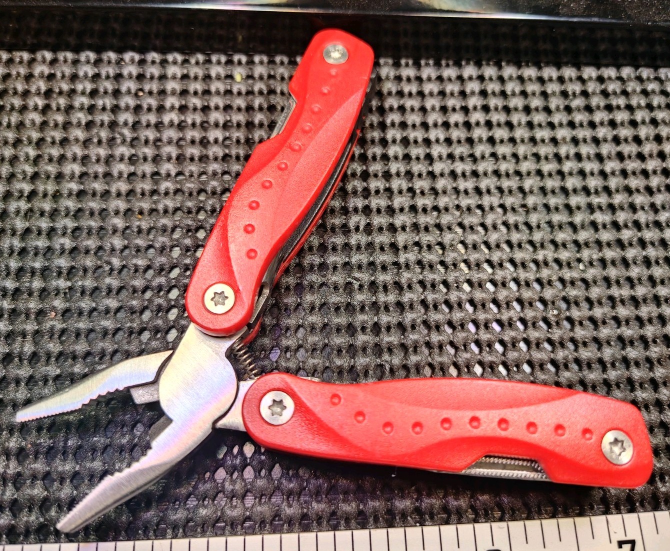 Small Multi tool With Needle Point Spring Plyers Red Used