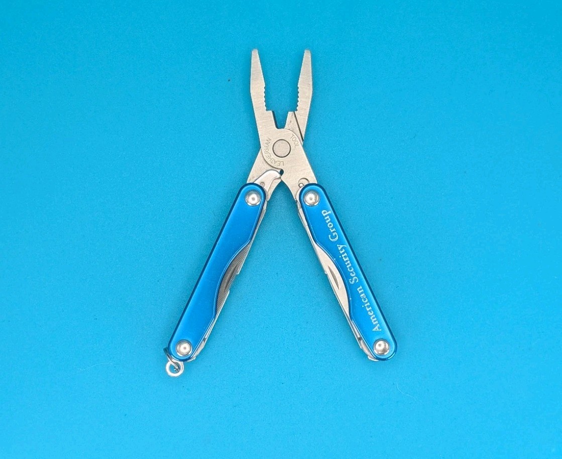 Leatherman Squirt P4 Multi-Tool, Key Ring, Retired! AMERICAN SECURITY GROUP