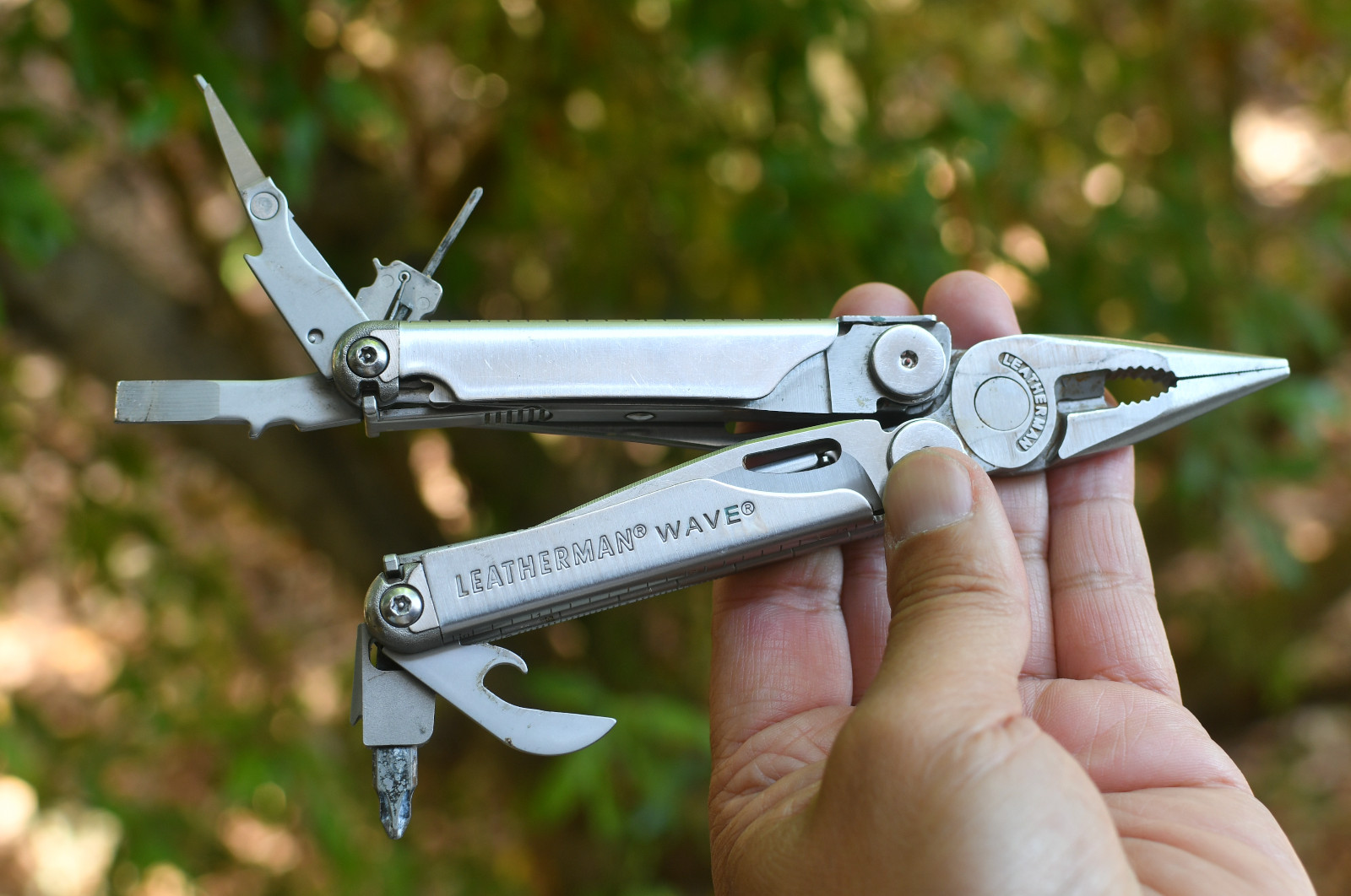LeatherMan Wave Pocket Knife  Blades Rust