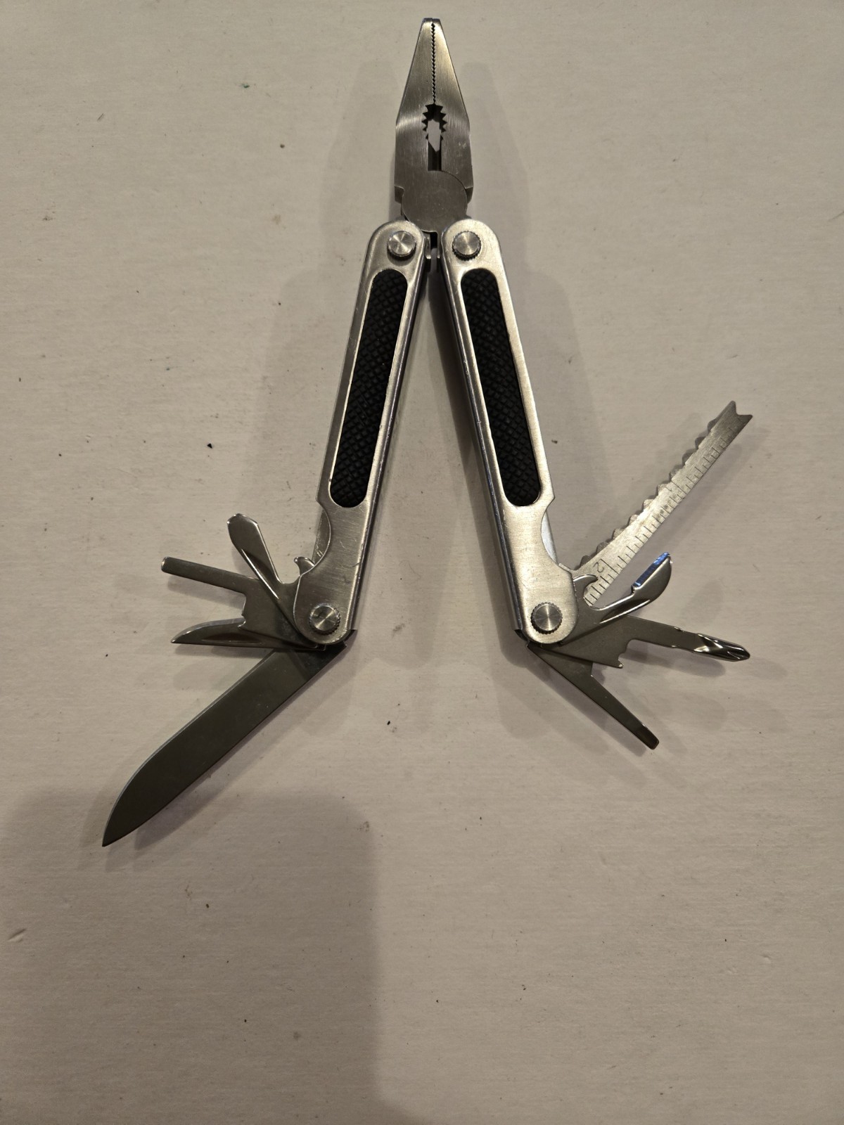 Gander Mountain 10-in-1 Multi Tool, Silver With Black Rubber Inlay Handles
