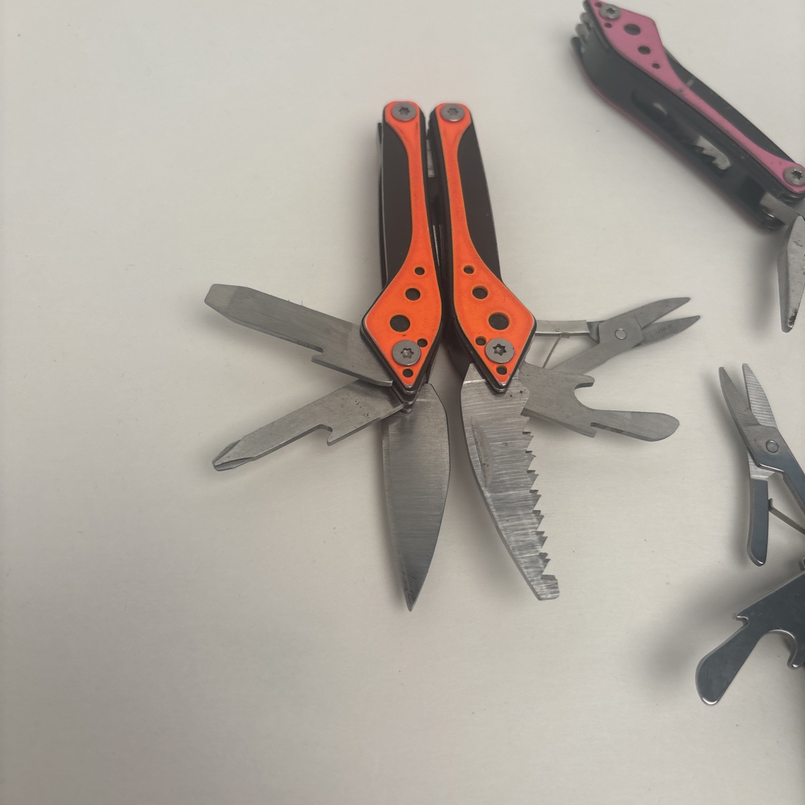 Cabela’s LOT of 4, Orange Teal Silver Pink Small Multi-Tool Camp Hike Hunt Fish