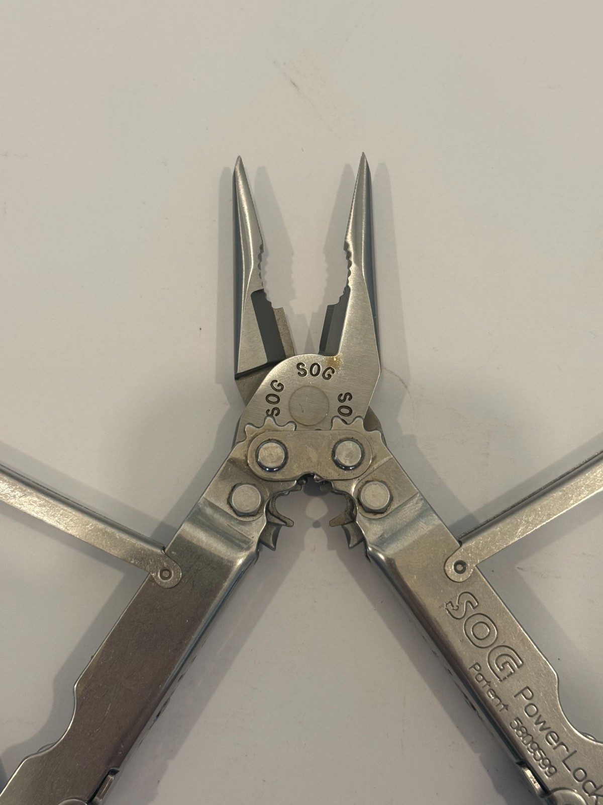 SOG PowerLock Stainless Multi-Tool Patent 5809599 w/ Leather Sheath