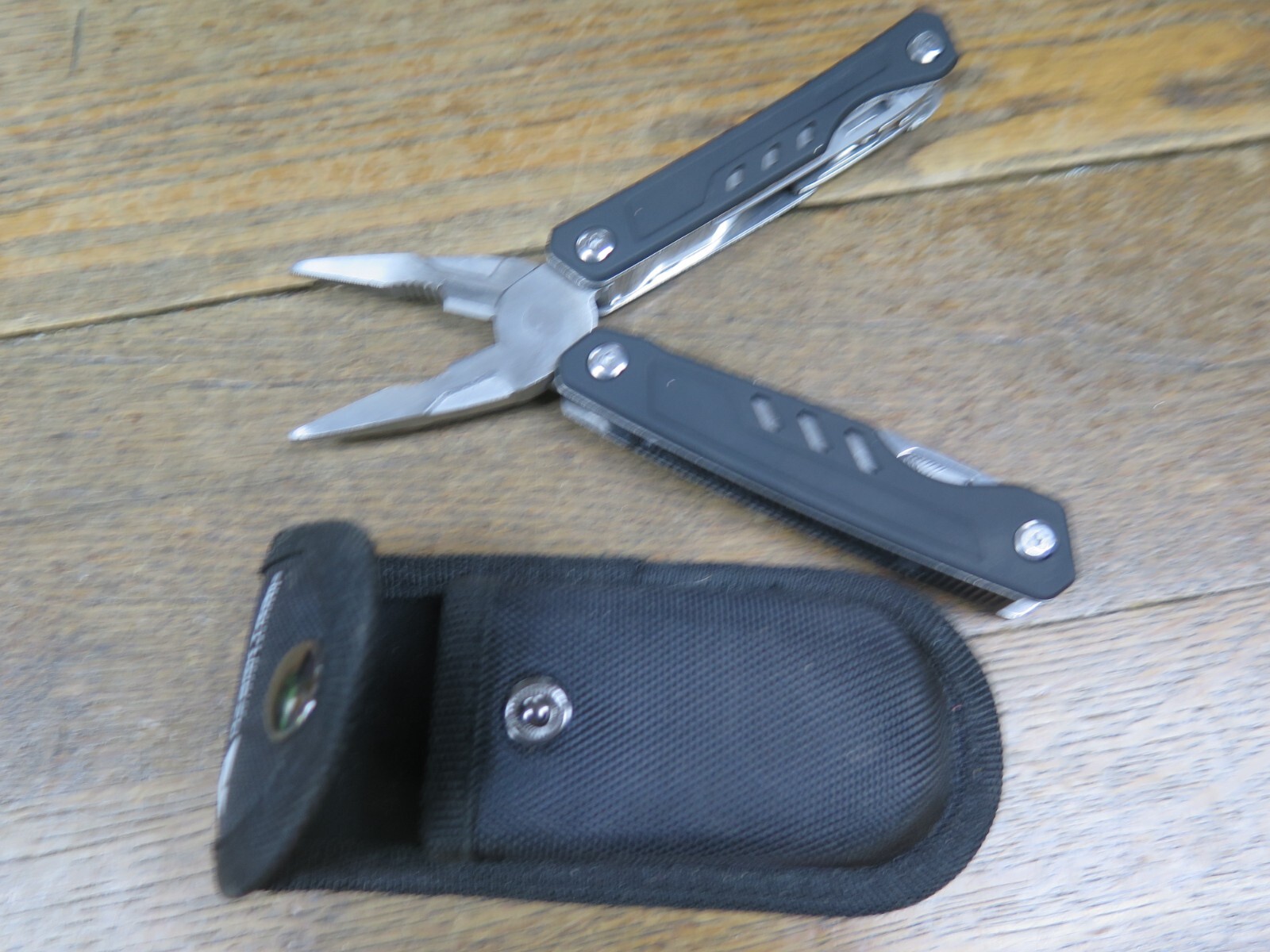 Ozark Trail Multitool Spring Loaded Pliers BLACK HANDLE WITH SHEATH