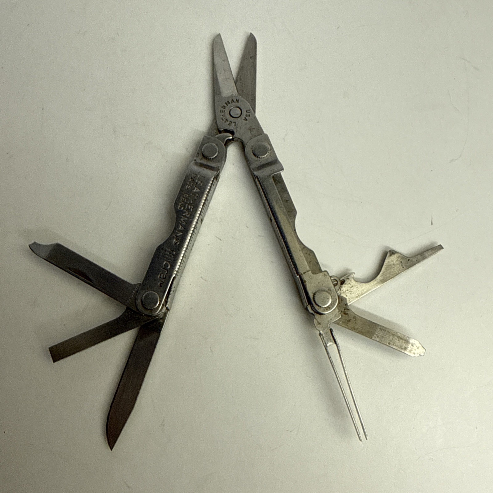 Leatherman Micra Stainless 10-in-1 Multi-Tool Camping Hiking Fishing – As Is