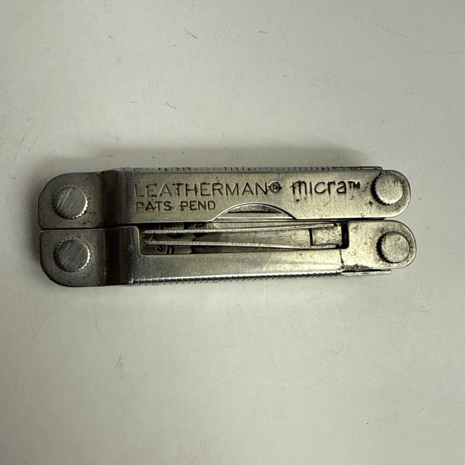Leatherman Micra Stainless 10-in-1 Multi-Tool Camping Hiking Fishing – As Is