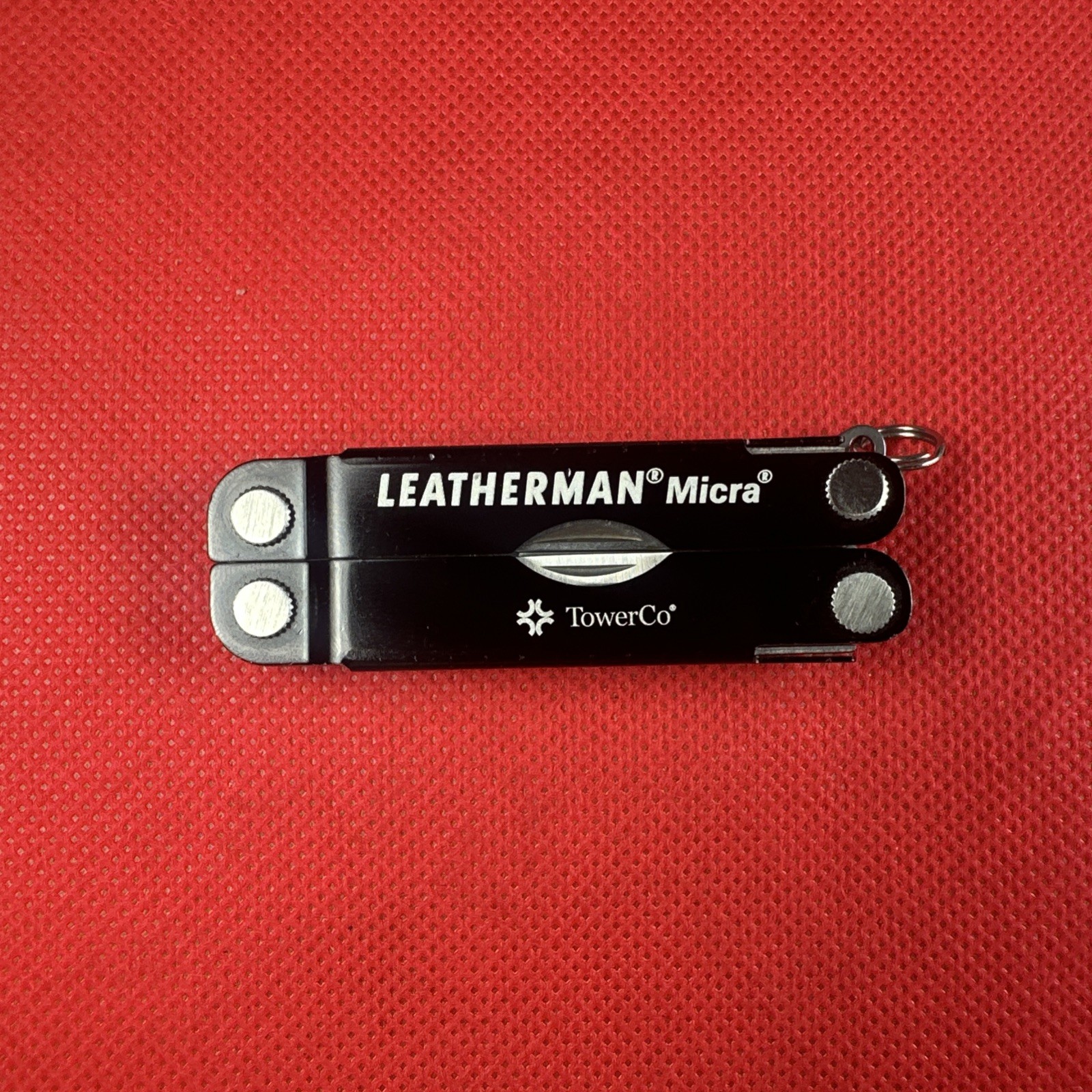 Nice Black Leatherman Micra Multi-Tool, scissor, knife, tweezer, screwdriver