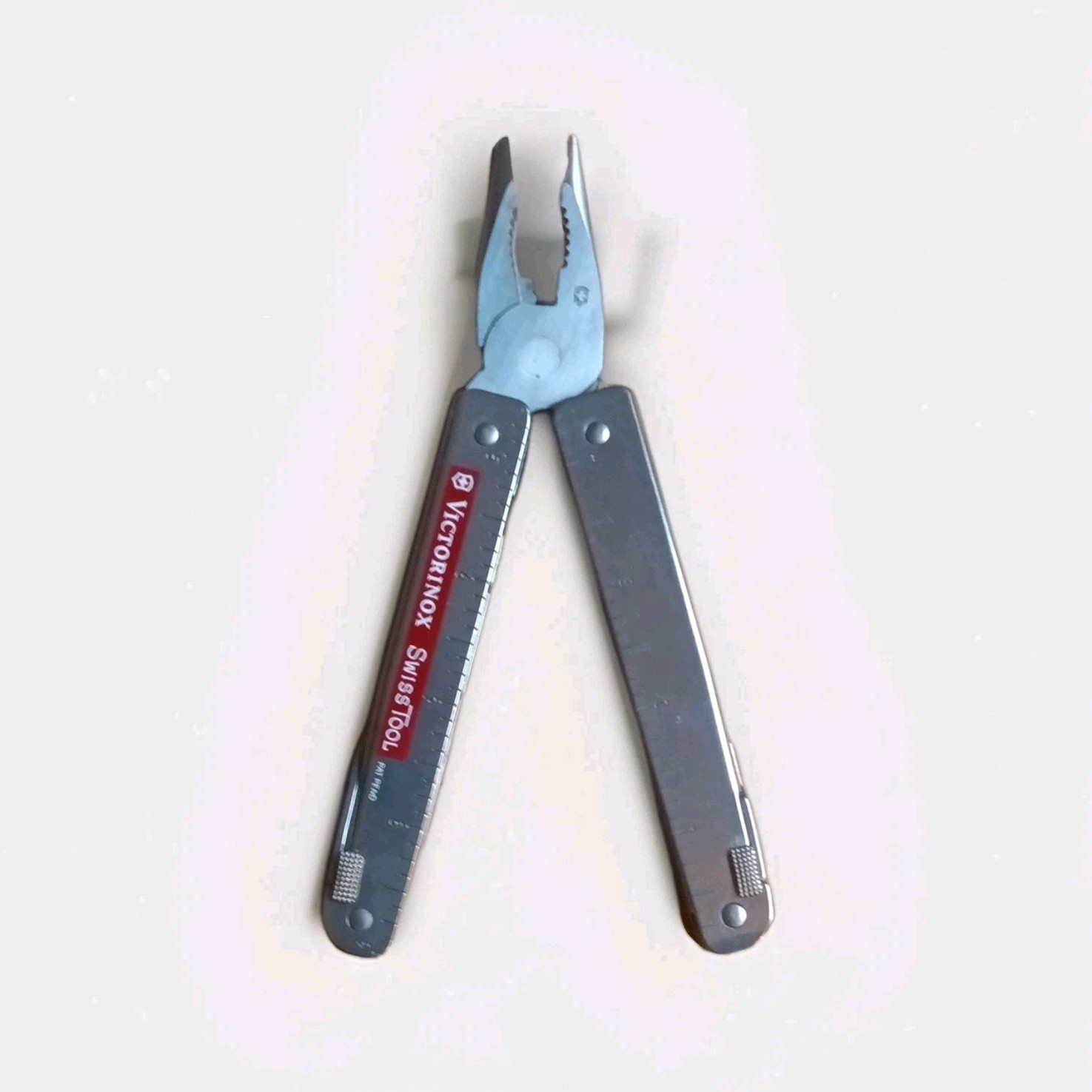 Victorinox SwissTool Stainless Steel Multi-Tool Serrated Blade w/ Sheath