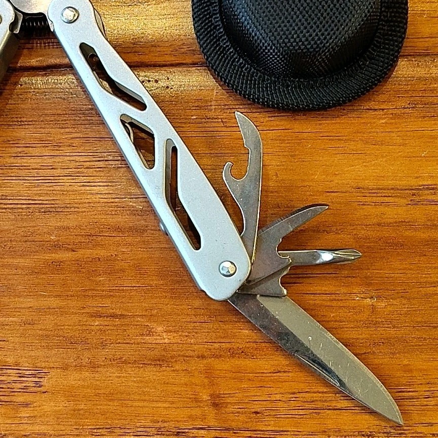 Ozark Trail 12-in-1 Multi Tool Silver Folding Pliers with Belt Sheath