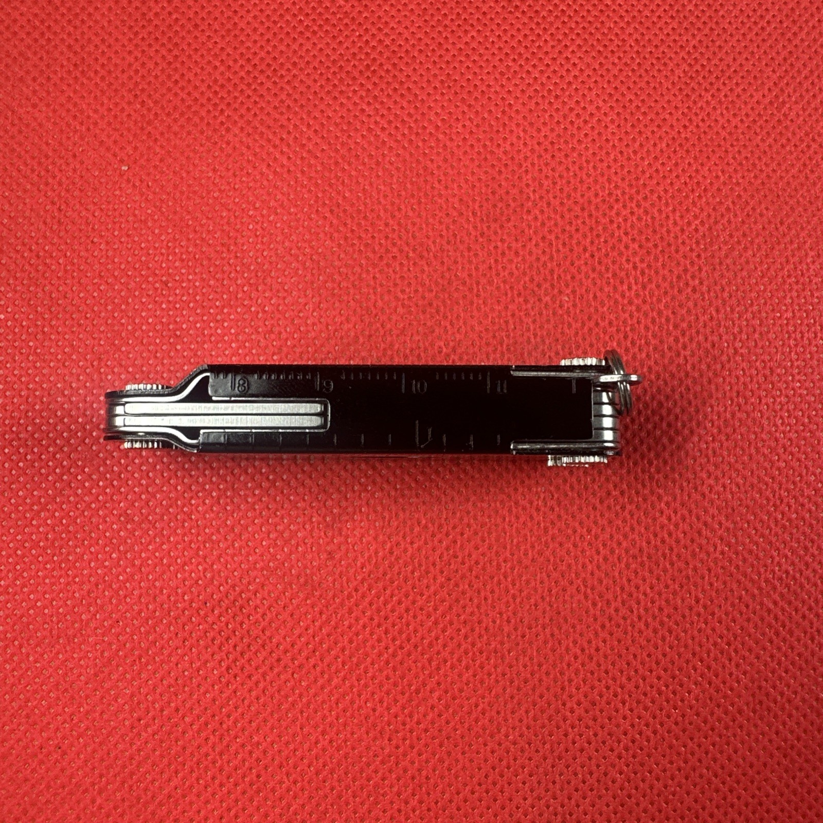 Nice Black Leatherman Micra Multi-Tool, scissor, knife, tweezer, screwdriver