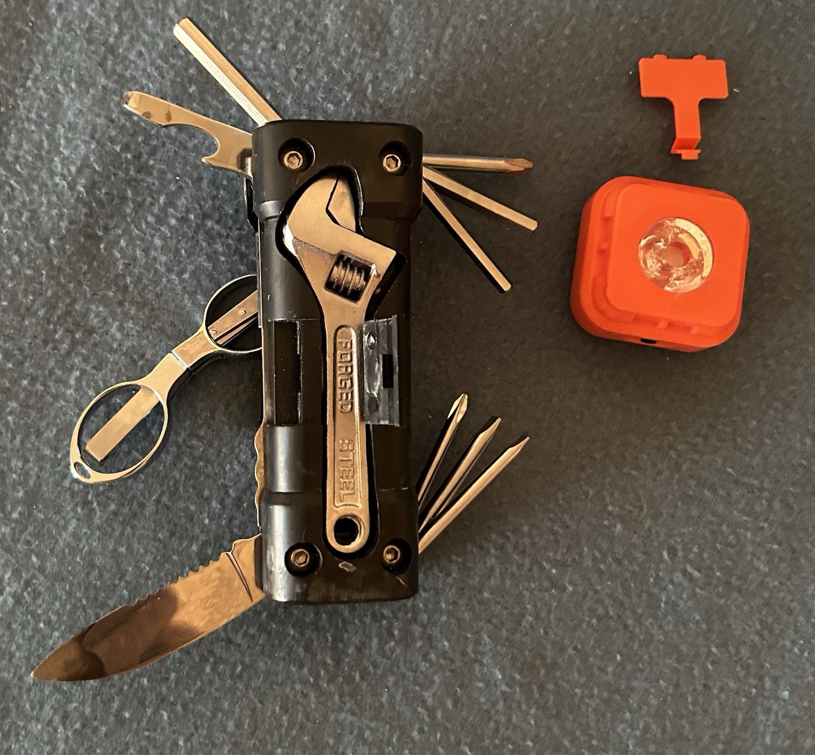 Black 8-in-1 Camping Multi-Tool w/ Serrated 1″ Knife, Scissors, Wrench, LED