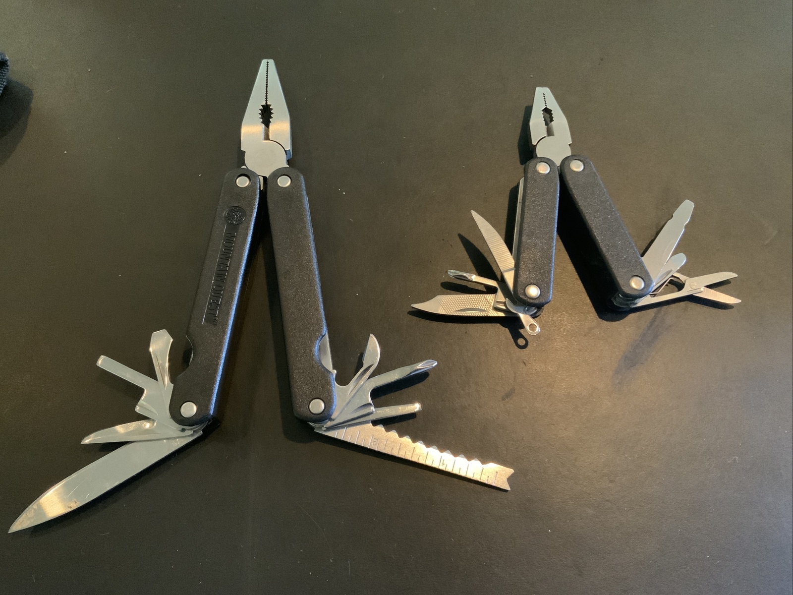 Lot of 2 Black Multi Tools Gilette Mach 3 & Generic Pliers Knife Saw