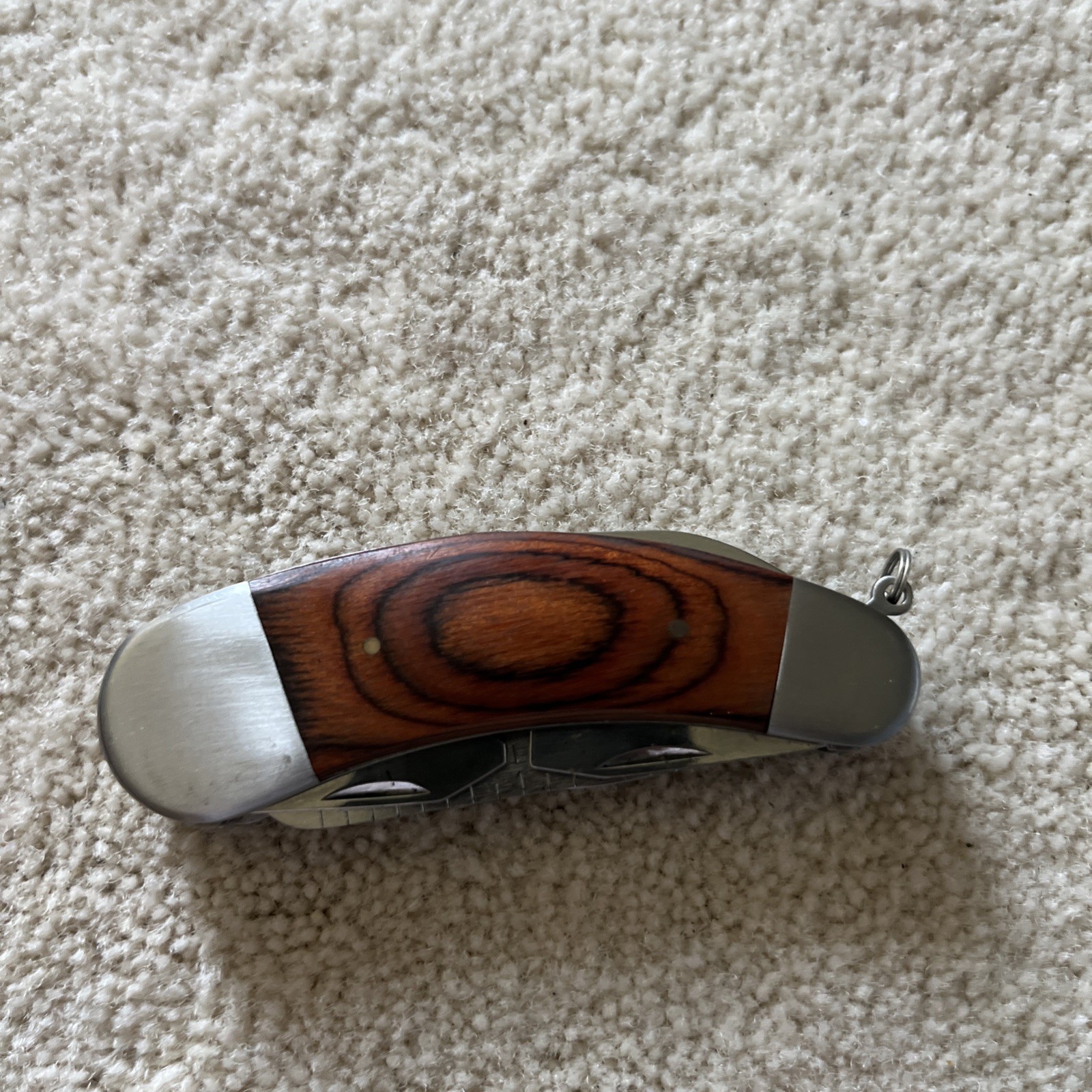 Camping Knife Wooden Handle with 7 Different Tools Attached with a Hanging Ring