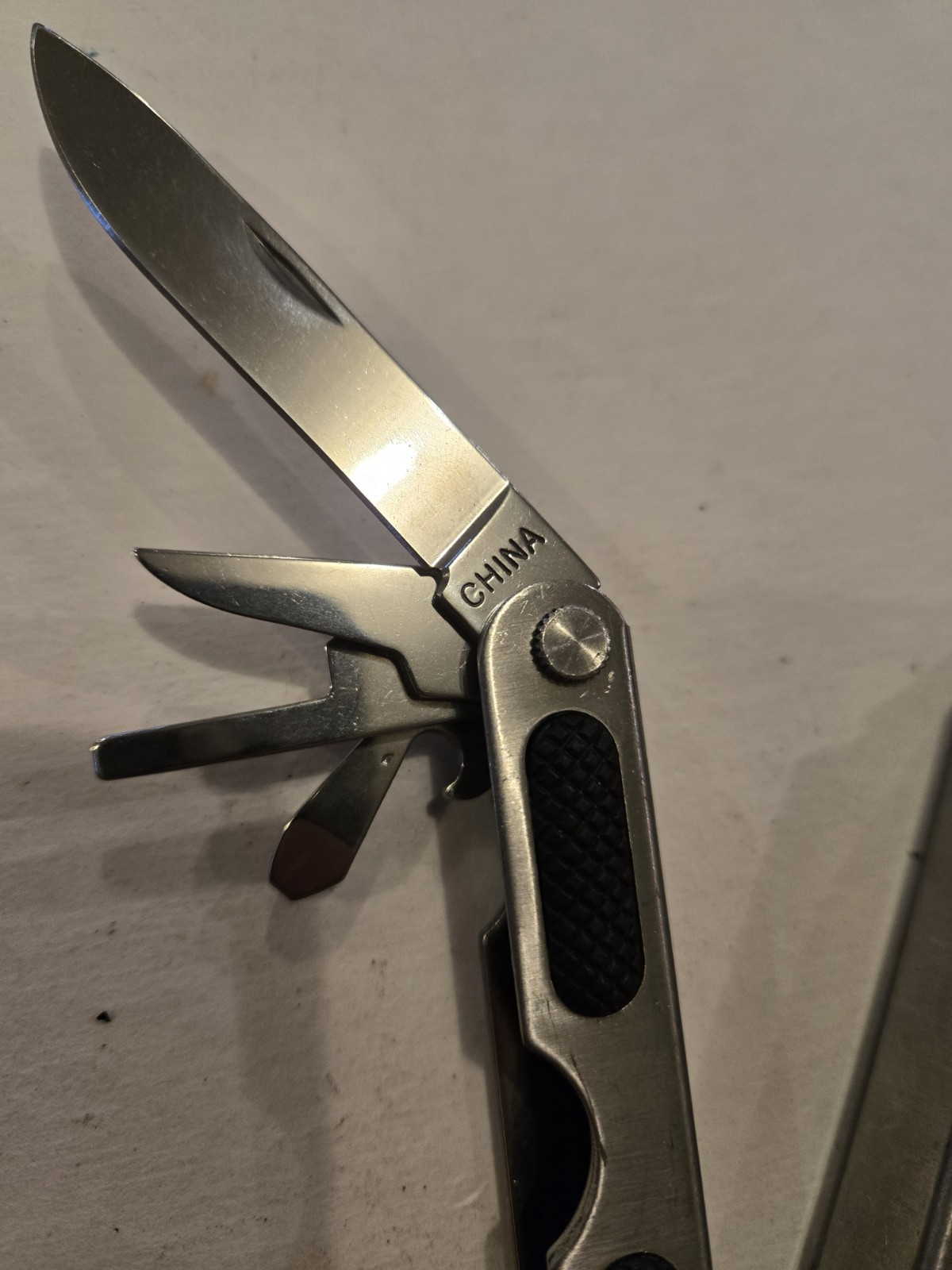 Gander Mountain 10-in-1 Multi Tool, Silver With Black Rubber Inlay Handles
