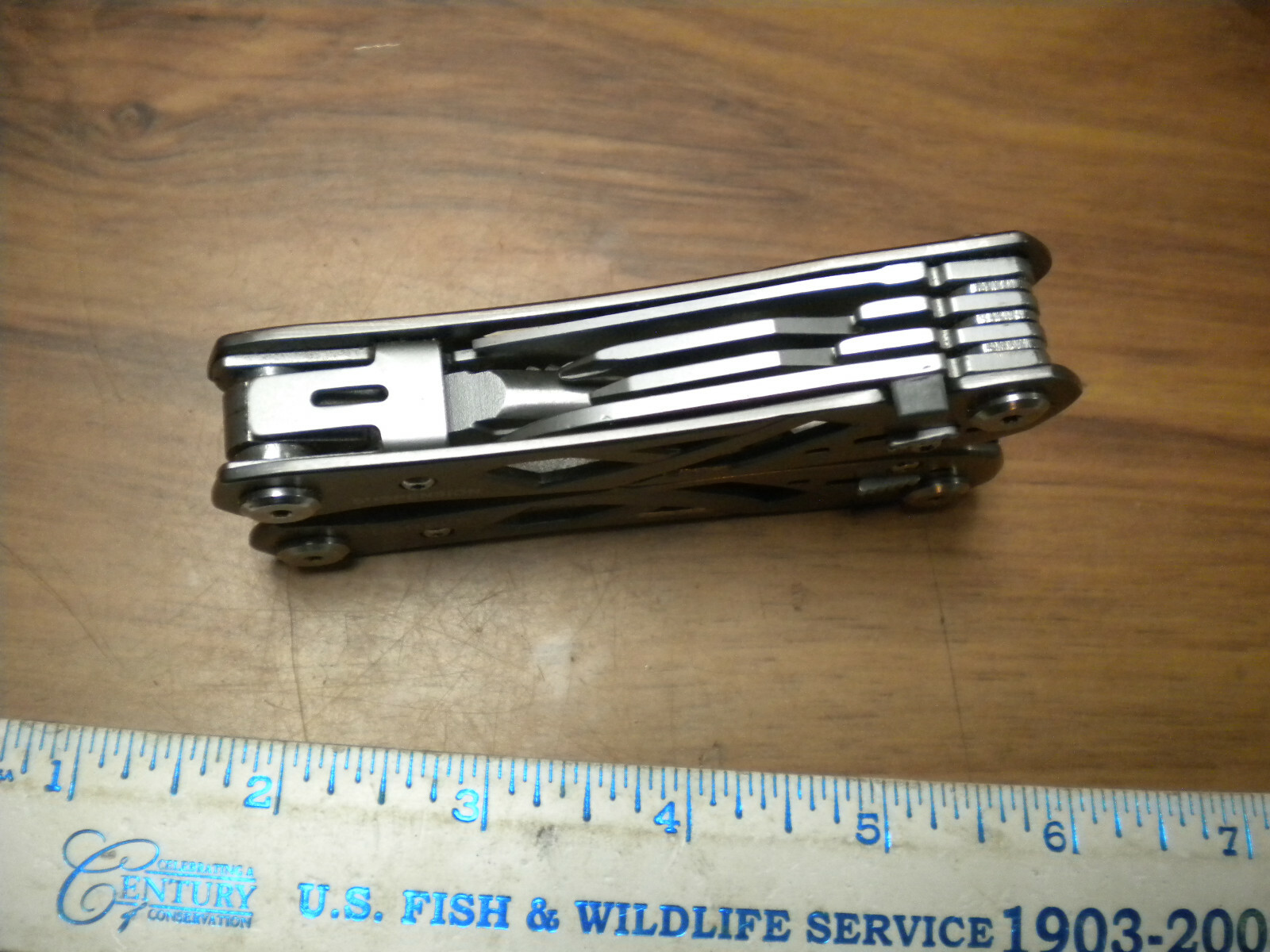 Gerber Suspension Multi-Tool with black nylon belt sheath in used excellent con