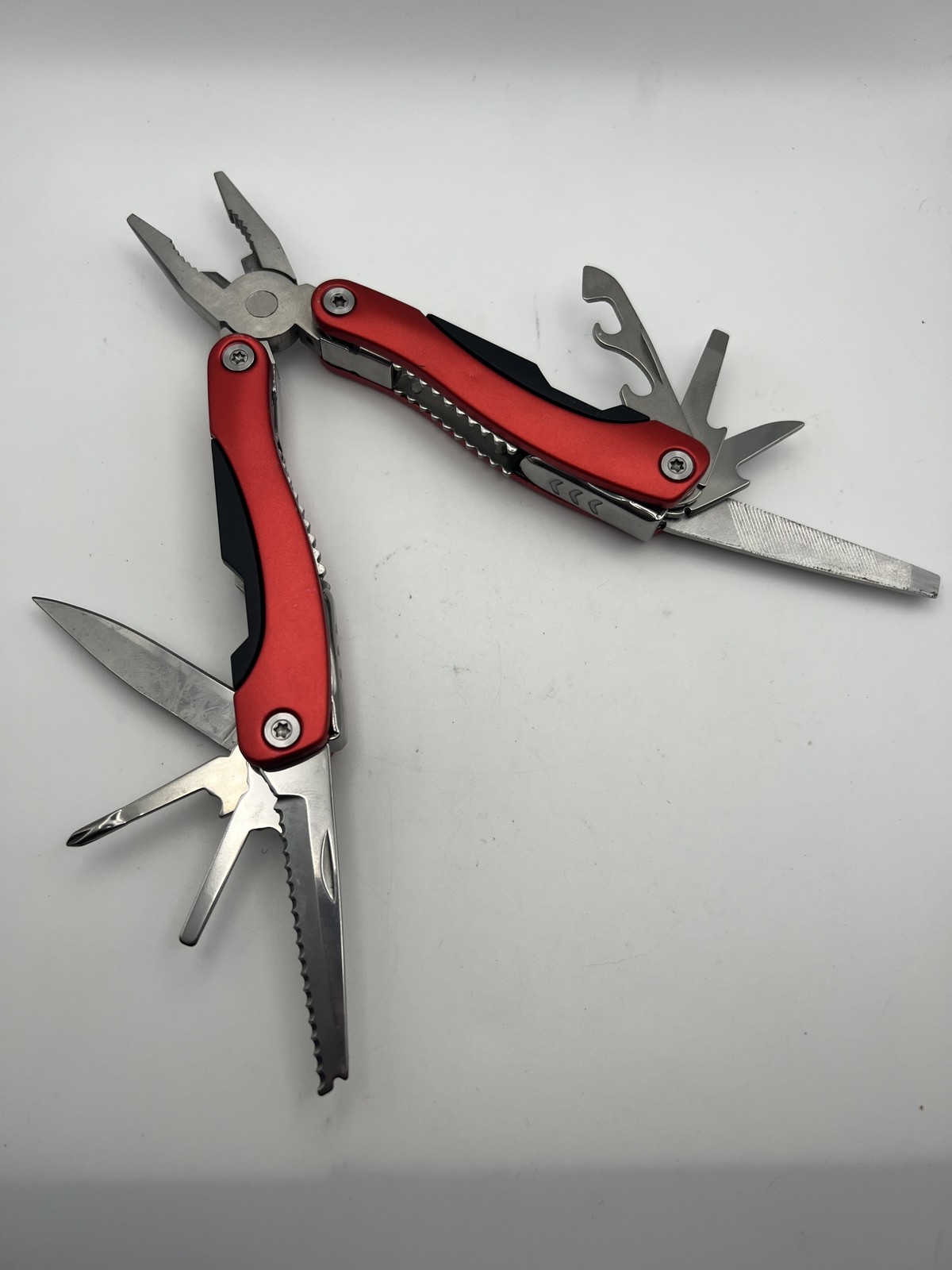 Pro-Grade Multi Tool Folding Pocket Pliers Knife Saw File Bottle Opener with Cas