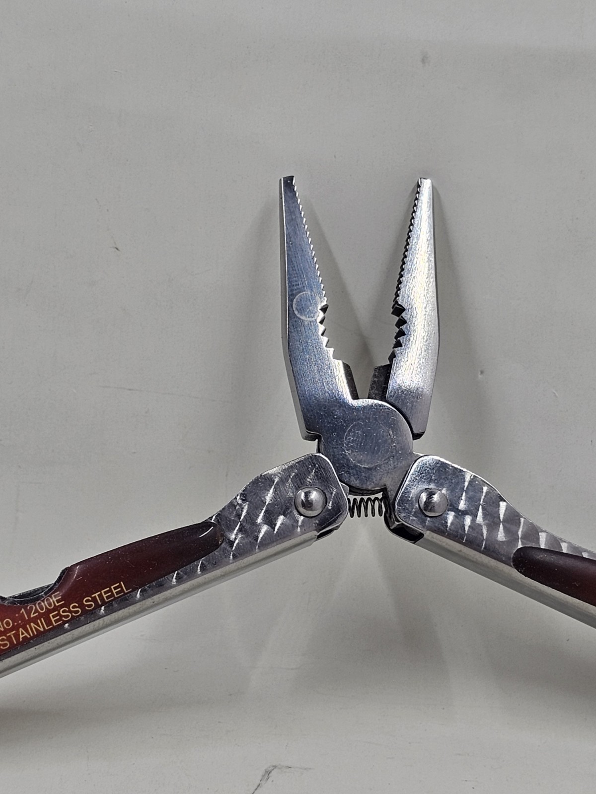 Sheffield No 1200E Stainless Steel Multi Tool Pliers Saw Knife Red Handle 4in