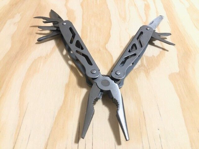 Ozark Trail (12 IN 1)stainless S multi tool with sheath -SILVER- Great Condition