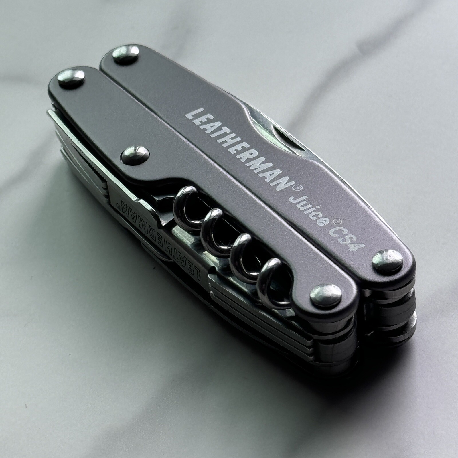 New, Early Leatherman Juice CS4 Storm Gray multitool.