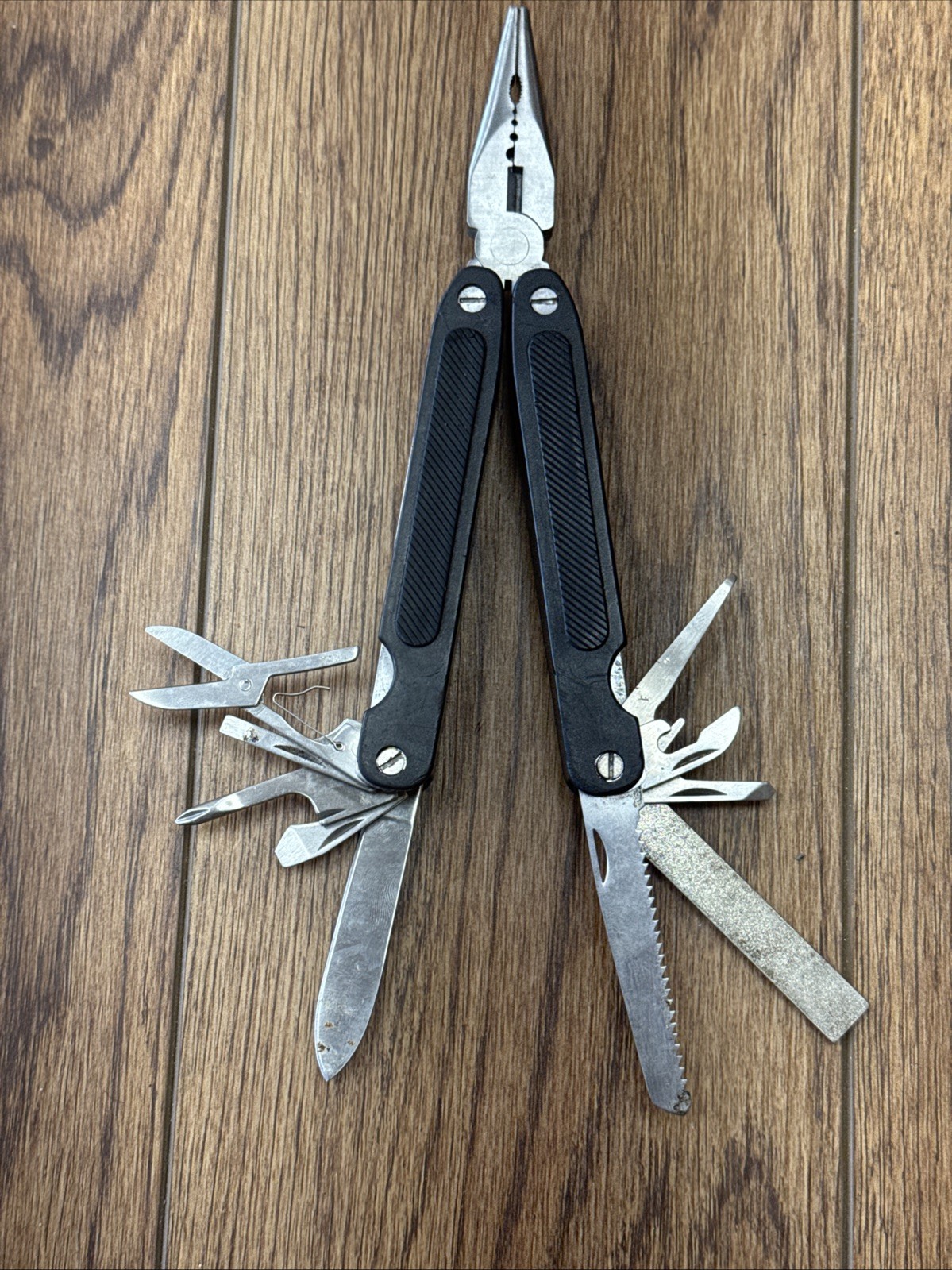 11-in-1 multi tool Pliers Knife Opener File Survival Hunting Camping