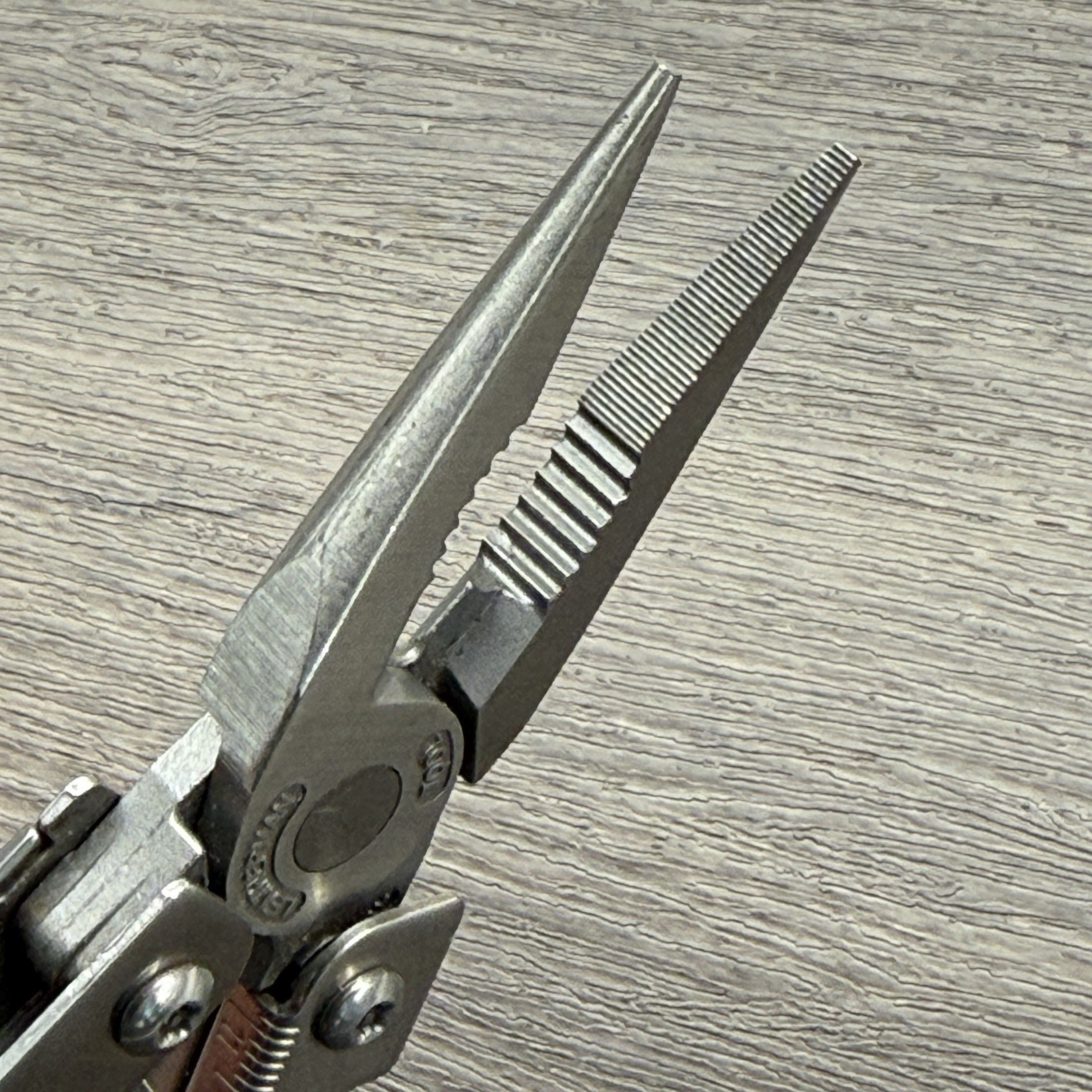 Leatherman Sideclip multitool. Lightly used. Late Run: shiny factory polished