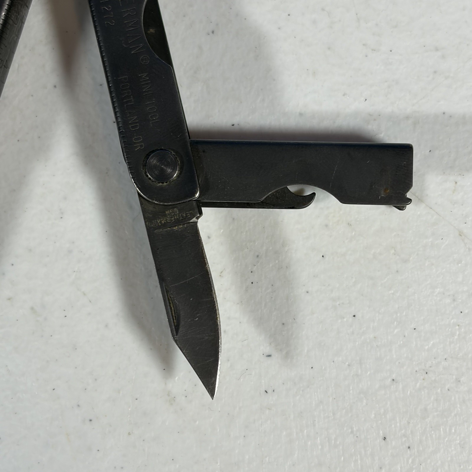 Leatherman Black MINI TOOL Black Multi Tool W/ Sheath