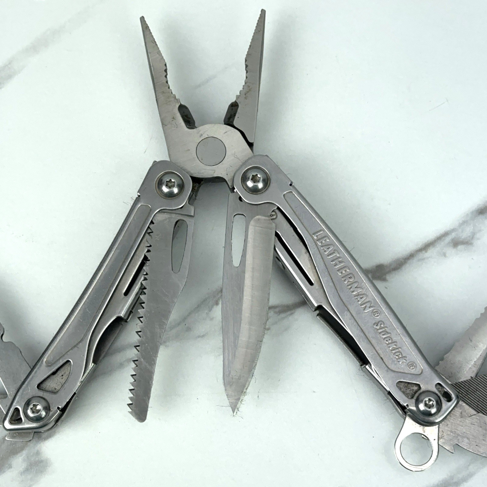 Leatherman Sidekick Multi-Tool, Knife, Pliers, Saw, Stainless *DATED 05/16