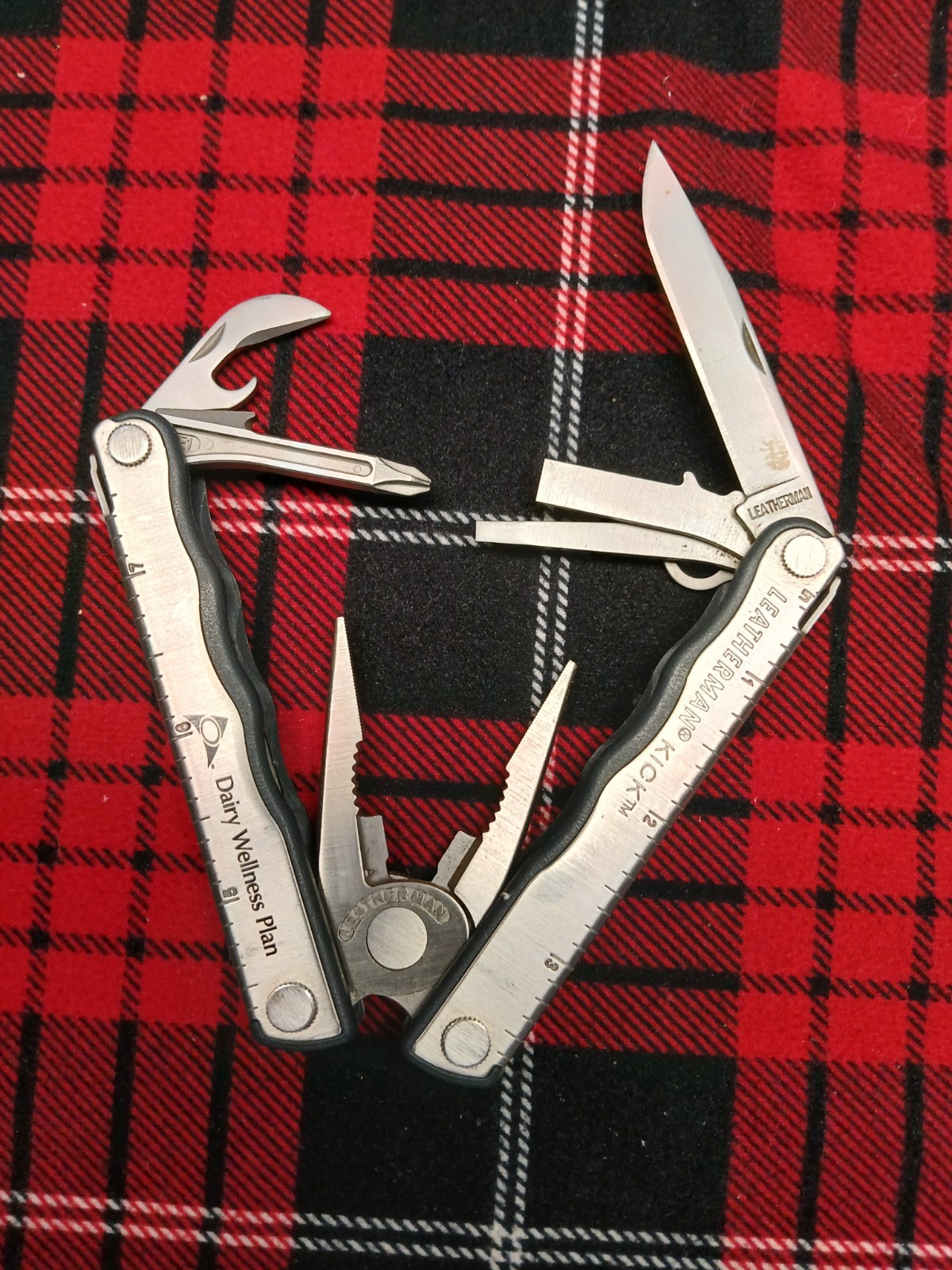 Leatherman Kick Multi-Tool In good Shape Has Dairy Wellness Plan Stamped on Side