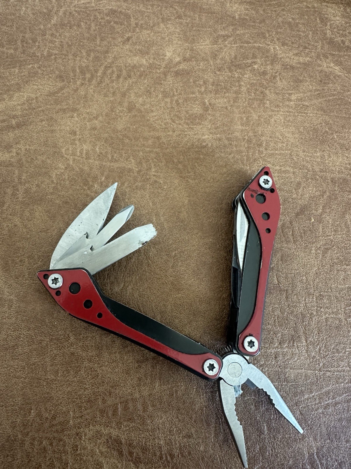 Cabela’s 4-1/2″ Multi-Tool in Red and Black with 7 Tools In One