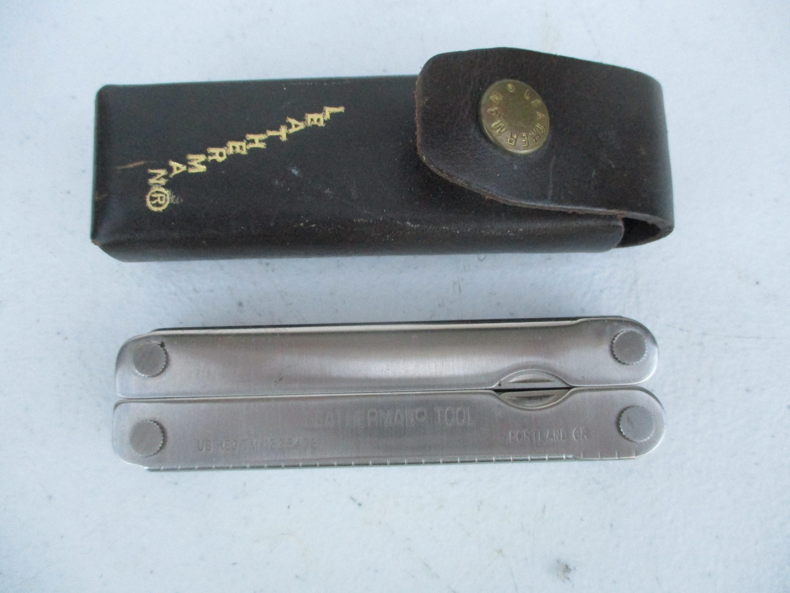 Leatherman Pocket Survival Tool USA Patent 1325473 w/ Leather Sheath Date 11/95