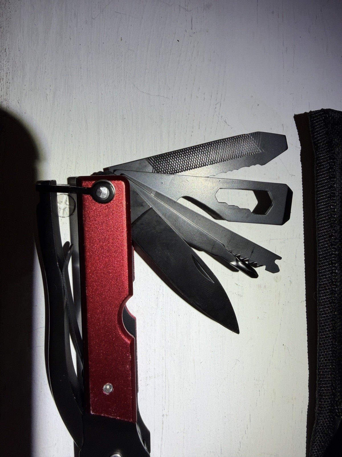 14-in-1 Outdoor Multitool Hammer – Survival Gear with Axe, Knife, Pliers.
