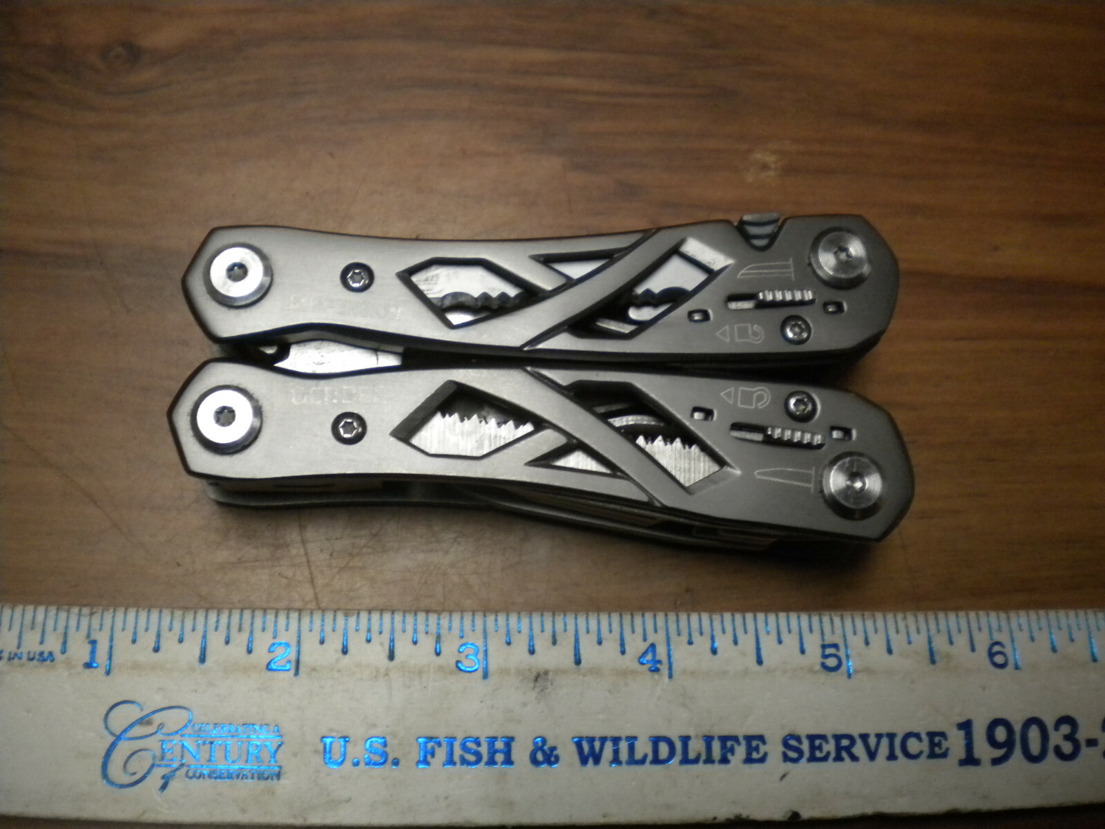 Gerber Suspension Multi-Tool with black nylon belt sheath in used excellent con