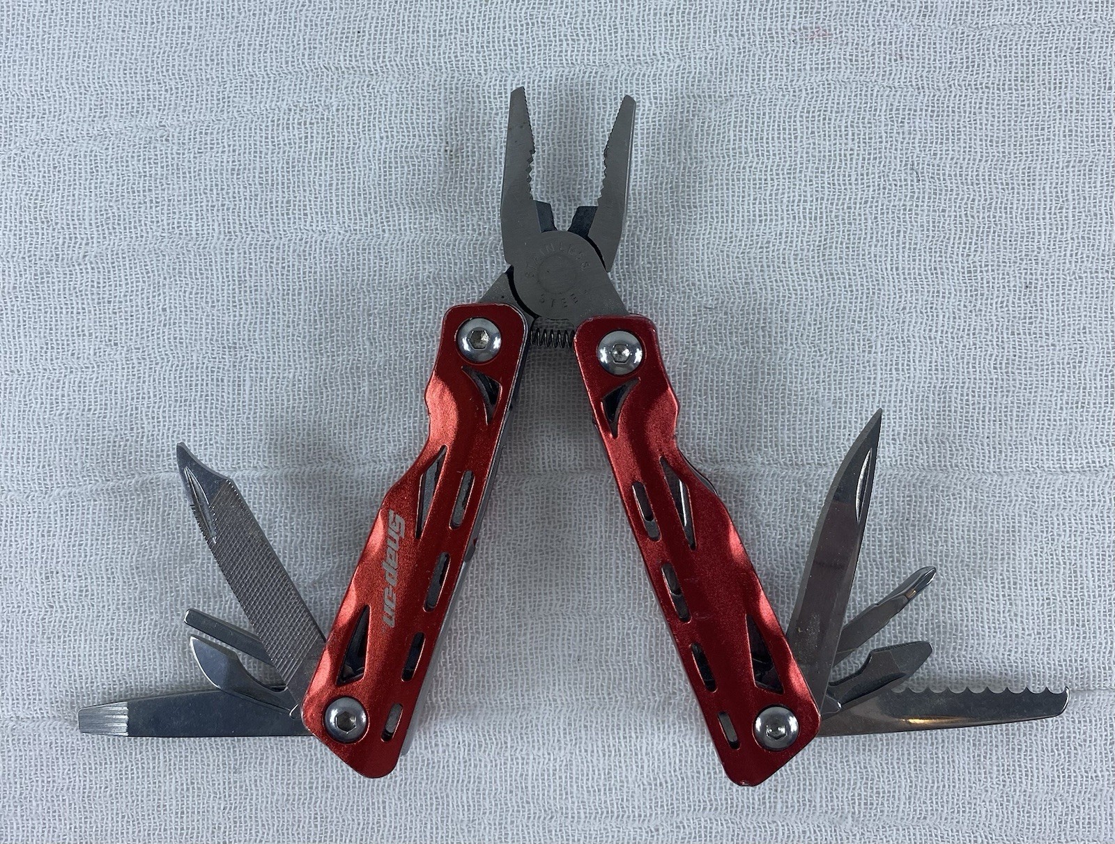 Snap-on Tool Red Stainless Steel Multi-Tool, Pliers, Knife, Screwdriver, 9 Tools