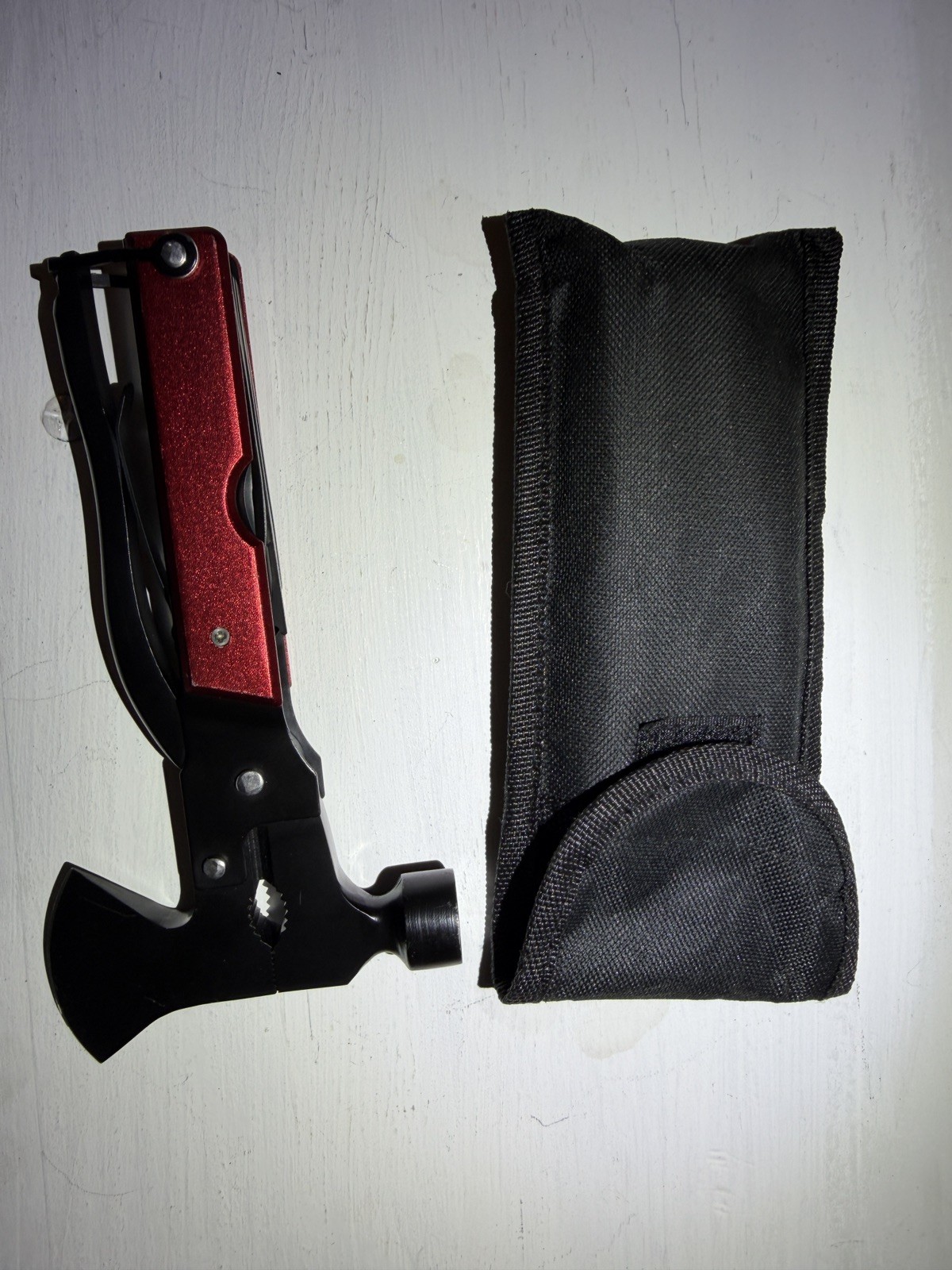 14-in-1 Outdoor Multitool Hammer – Survival Gear with Axe, Knife, Pliers.