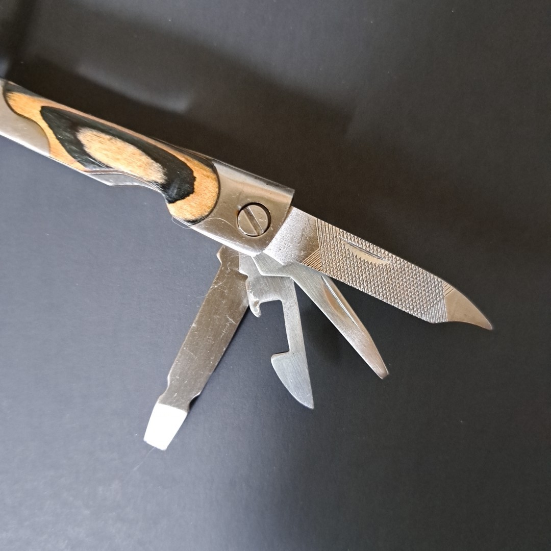 Multi tool With Laminated Wood Handles, Clean