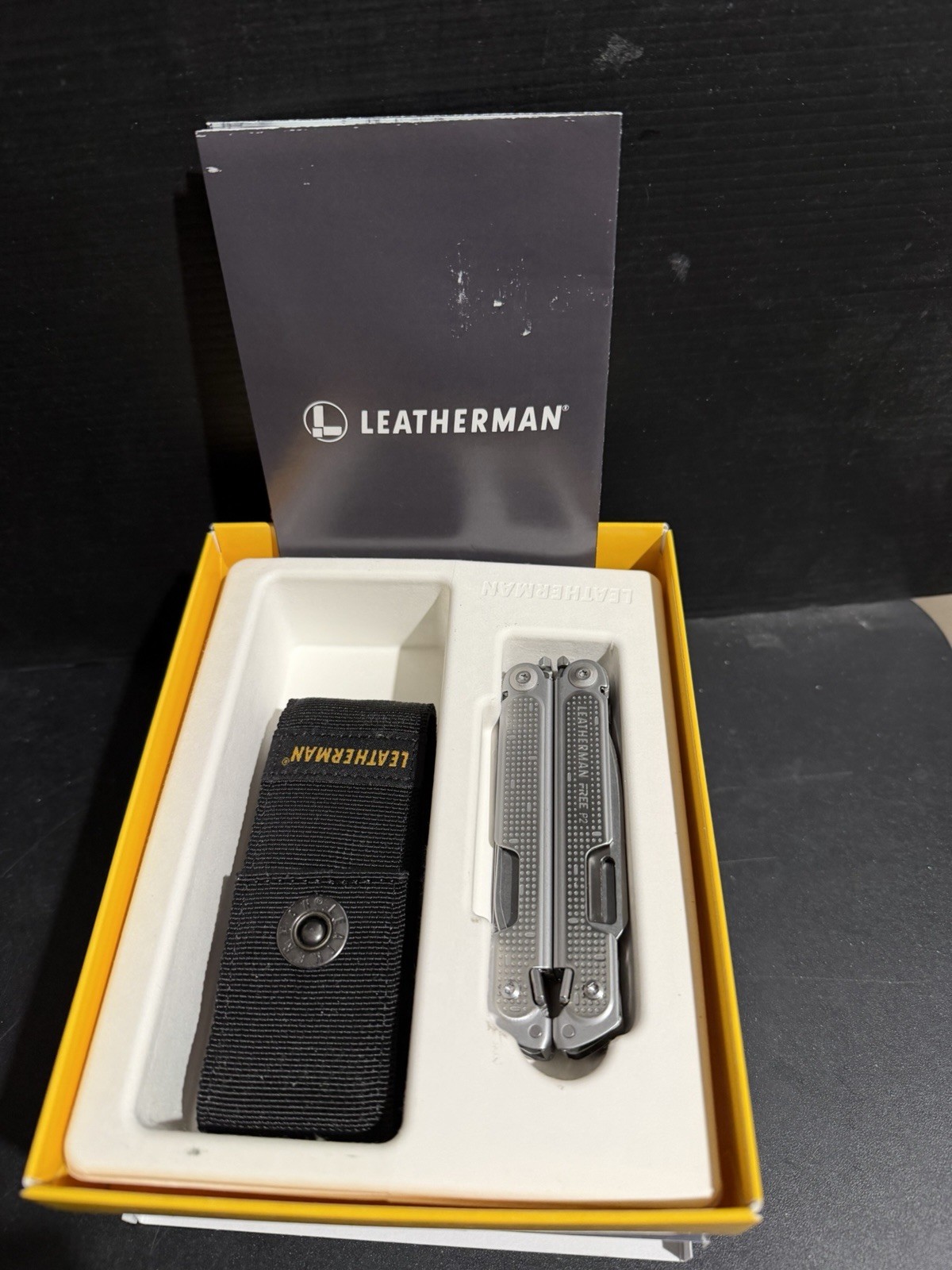 Discontinued New in box Leatherman FREE P2 Multitool 19 Stainless Steel One Hand