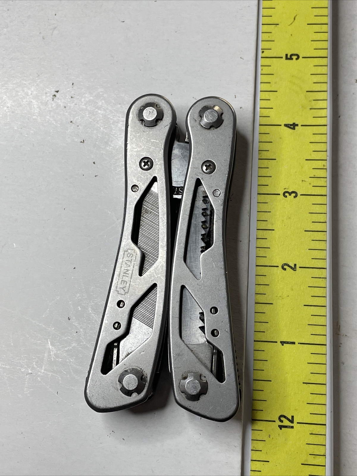 STANLEY MUTI TOOL STAINLESS 2CR 9 TOOL FUNCTIONS