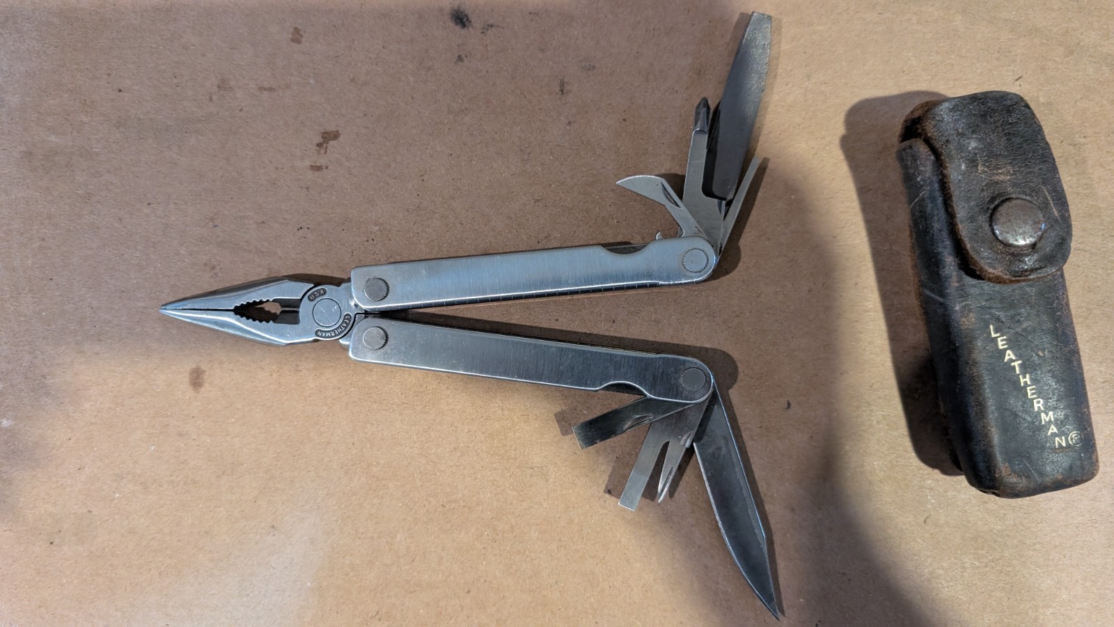 Vintage Original Leatherman TM 1325473 Multi Tool With Leather Sheath