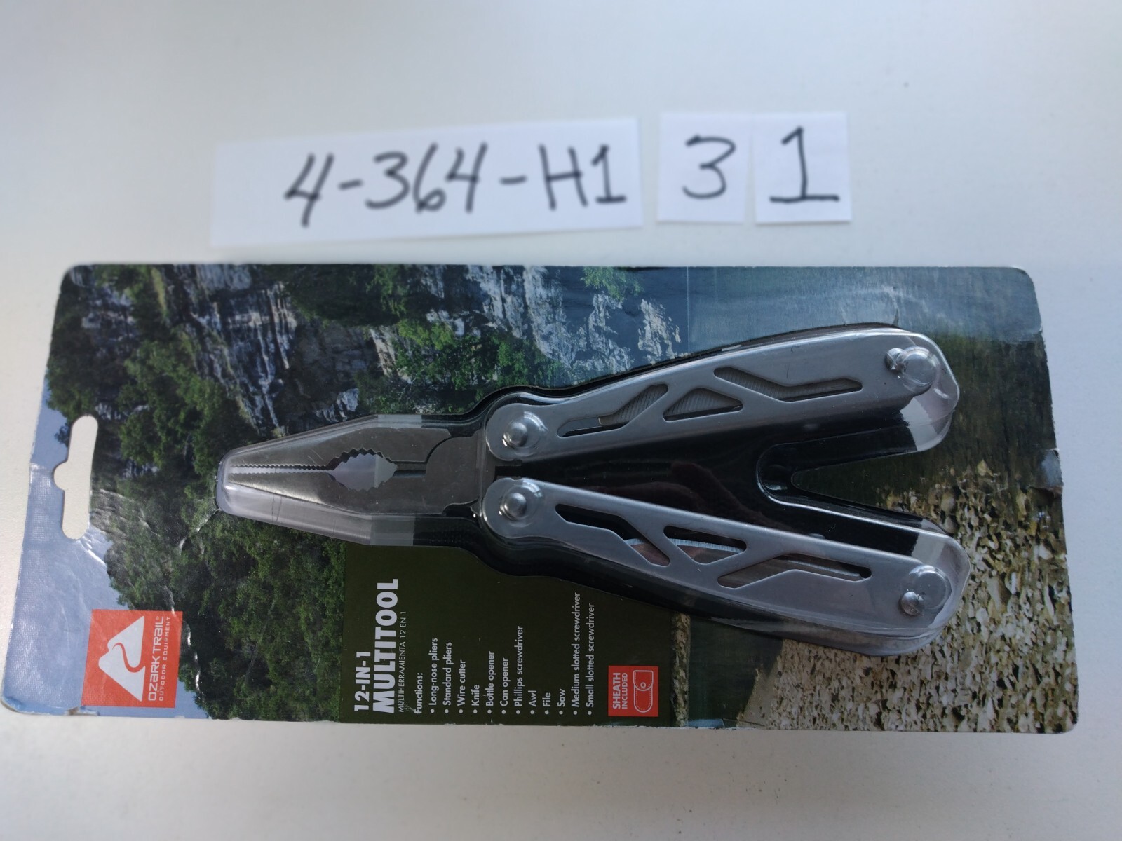 OZARK TRAIL 12 IN 1 MULTI TOOL, NEW IN WRAP $8 OR BEST OFFER WINS IT NICE GIFT